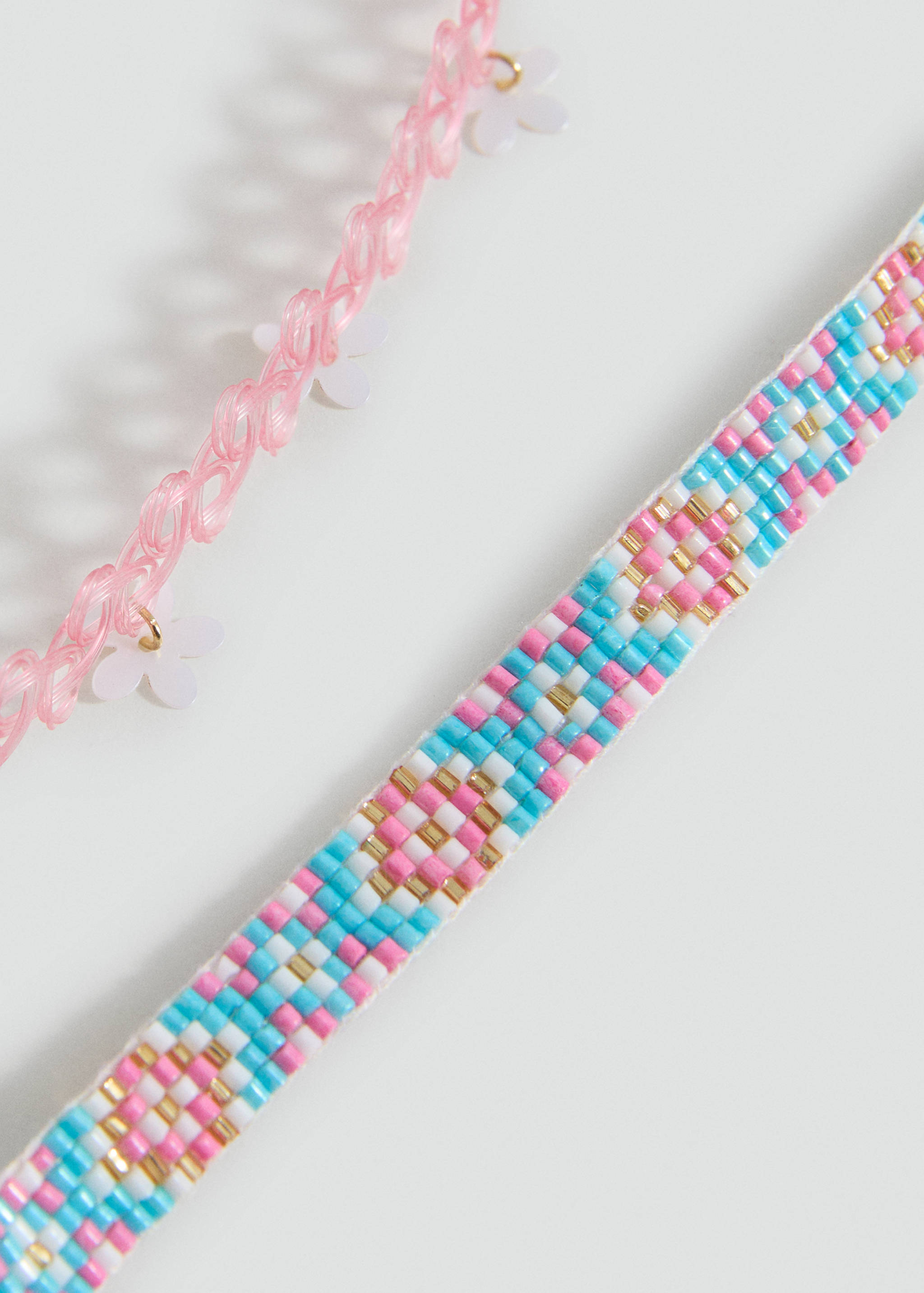 Σετ 2 κολιέ - Μεσαίο πλάνο