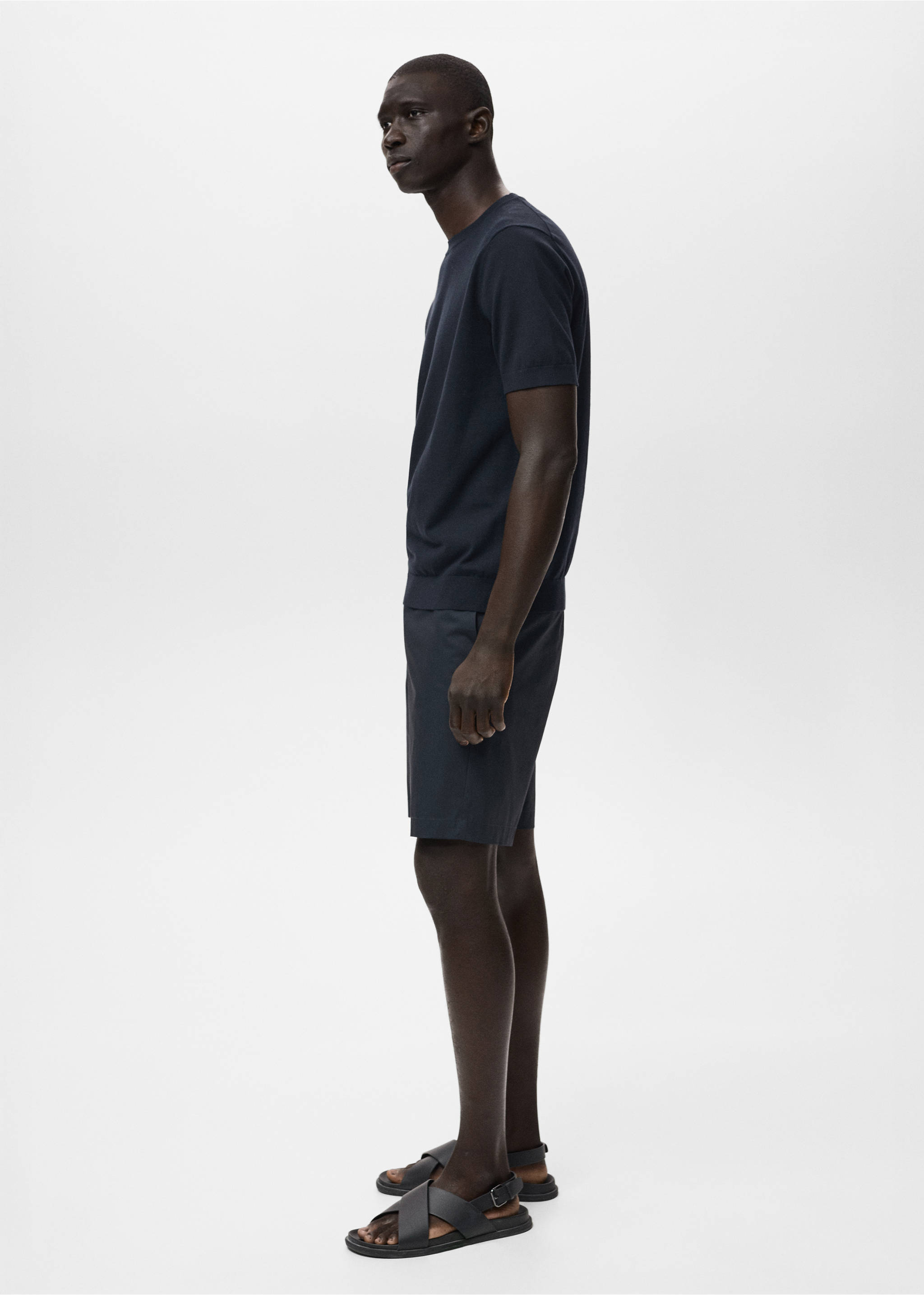 Navy blue bermuda shorts worn with a matching knit t-shirt., Navy. Ref: 17081161-00.