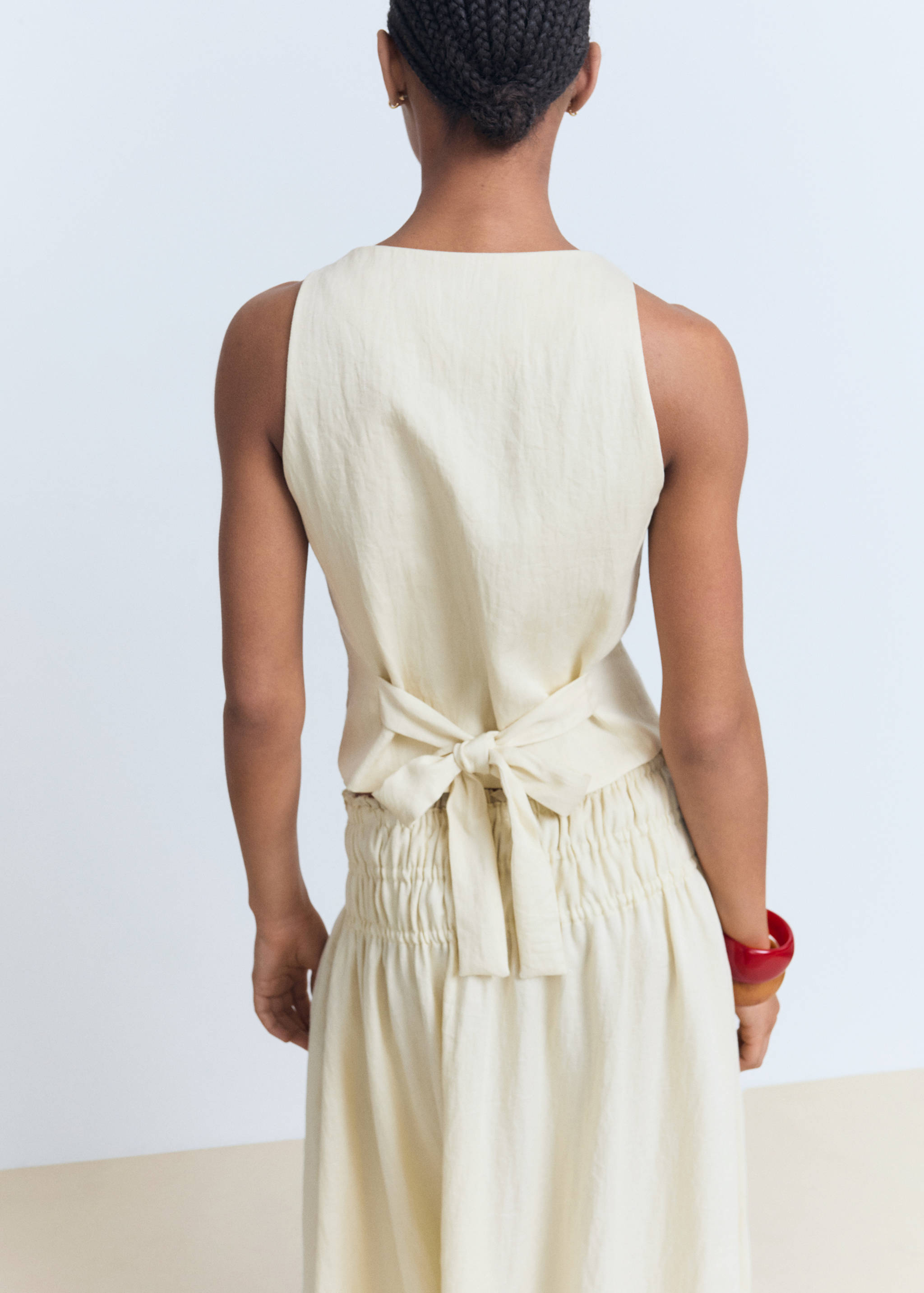 Chaleco lazo espalda - Reverso del artículo