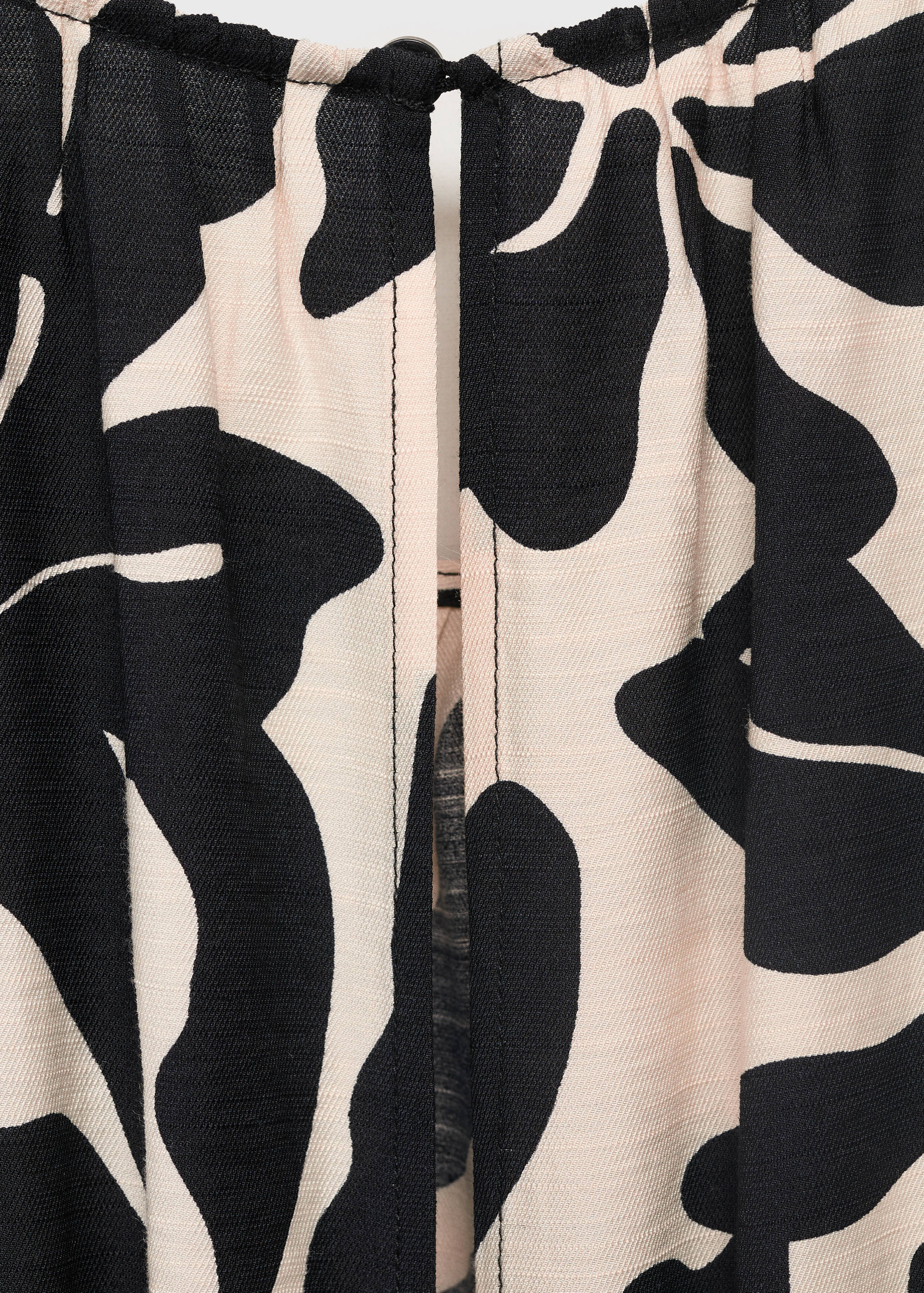 Mintás nadrágruha övvel - A termék adatai 0