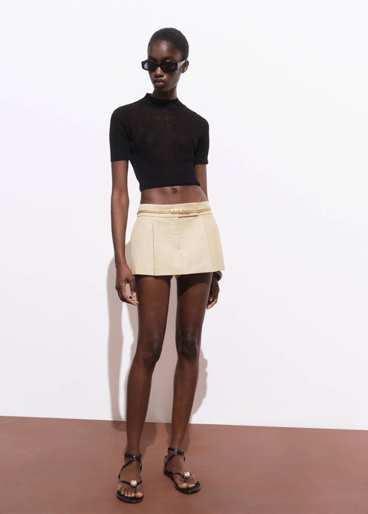 Mini-skirt with pleats — Beige