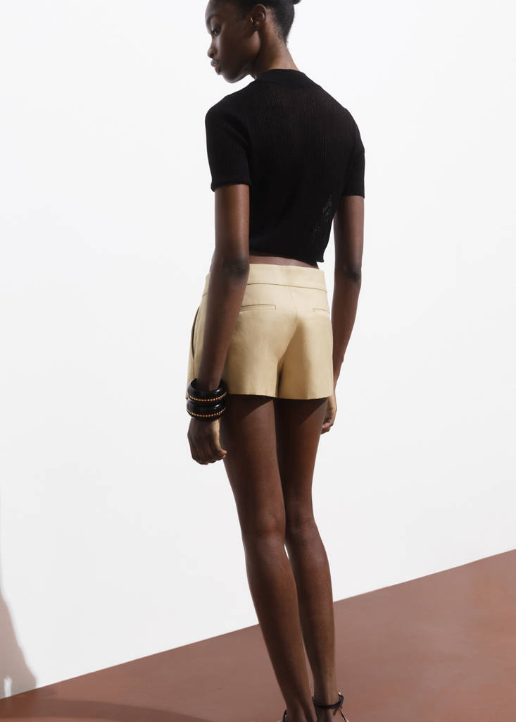 Mini-skirt with pleats — Beige