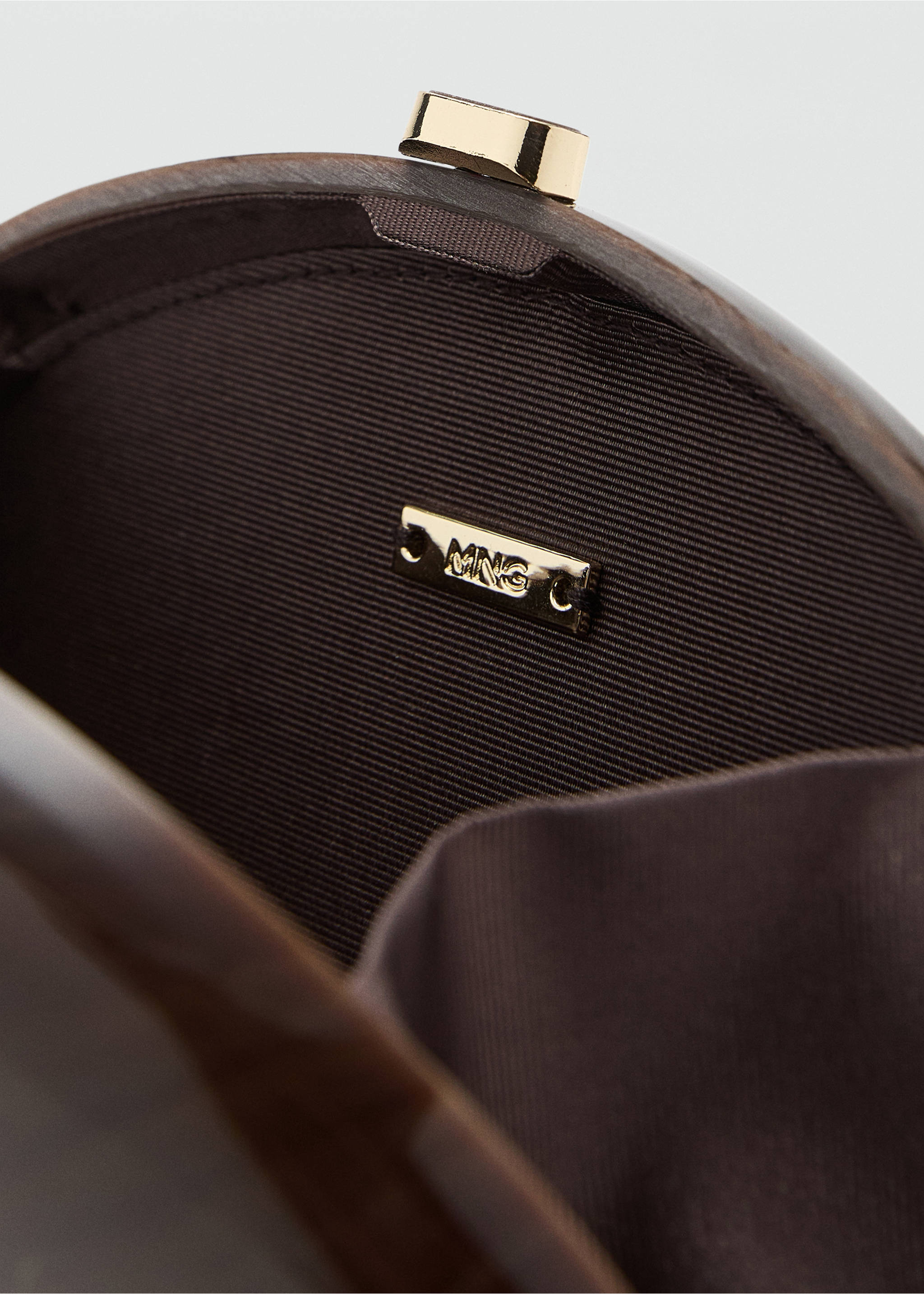 Pochette ovale - Détail de l'article 1, Chocolat. Ref: 17081292-00.