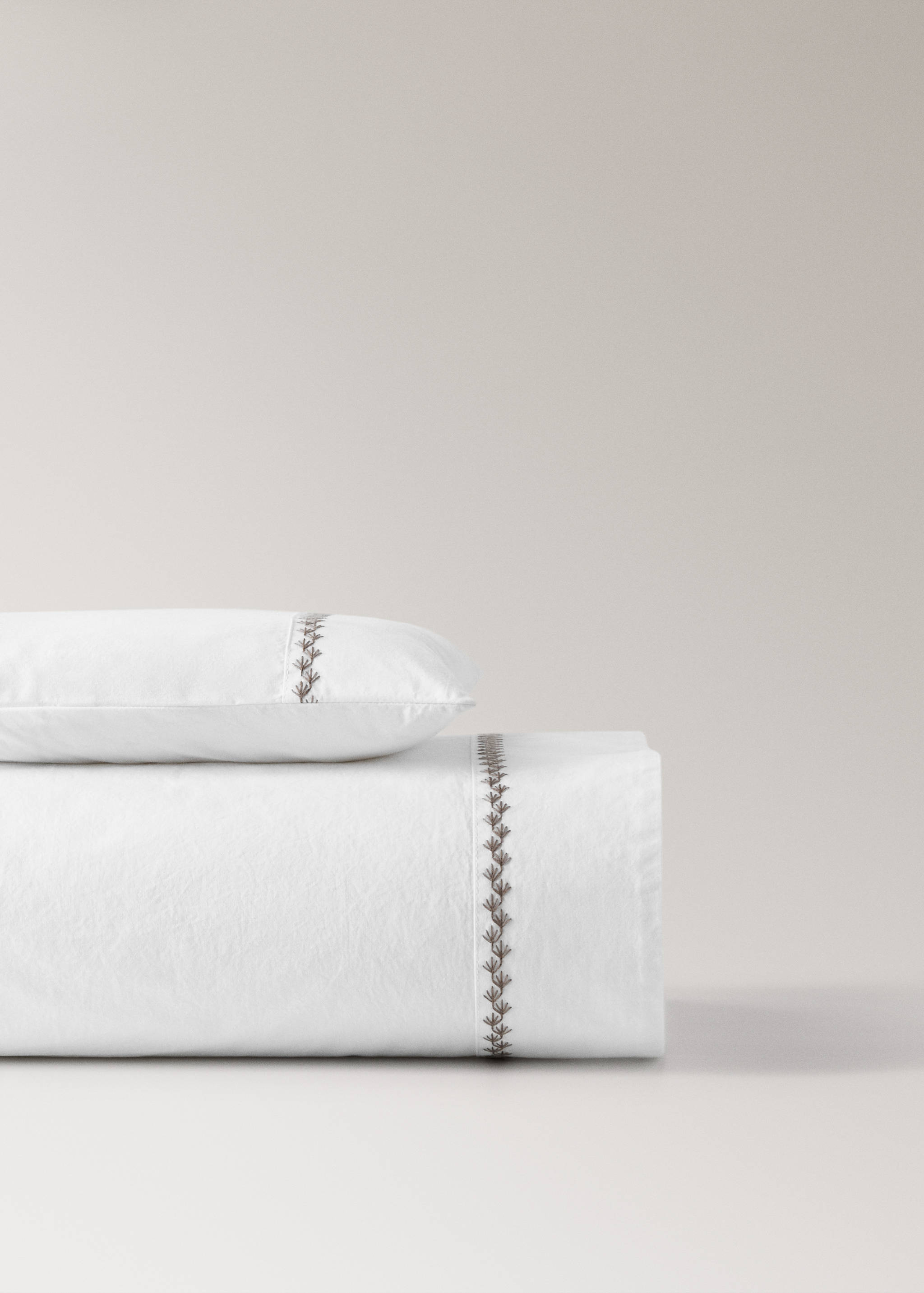 200-thread count percale cotton pillow set with embroidered detail for cot - Article without model