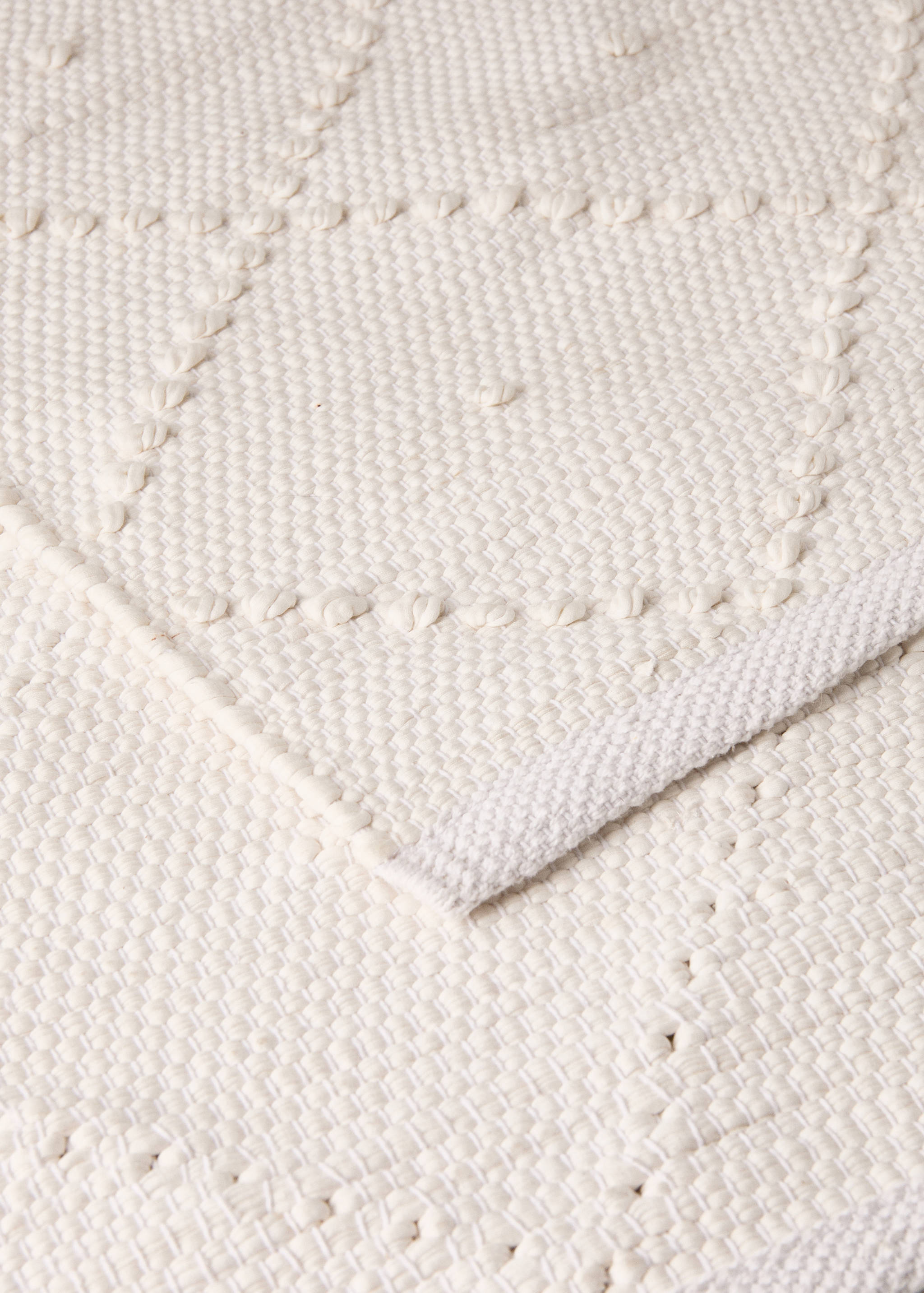 Children's cotton rug with diamond pattern and pom-poms - Details of the article 1