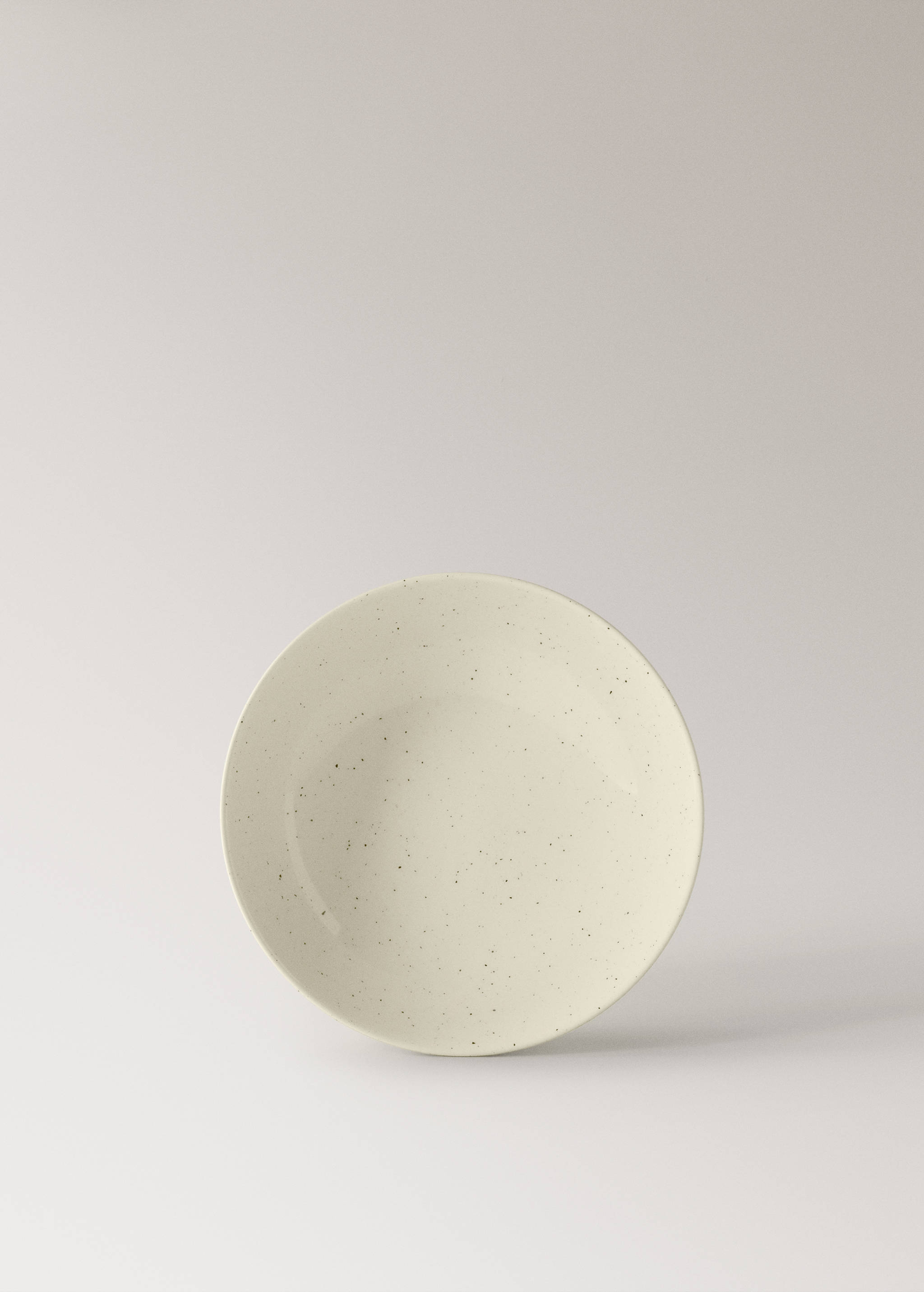 Deep stoneware plate with spots - Article without model