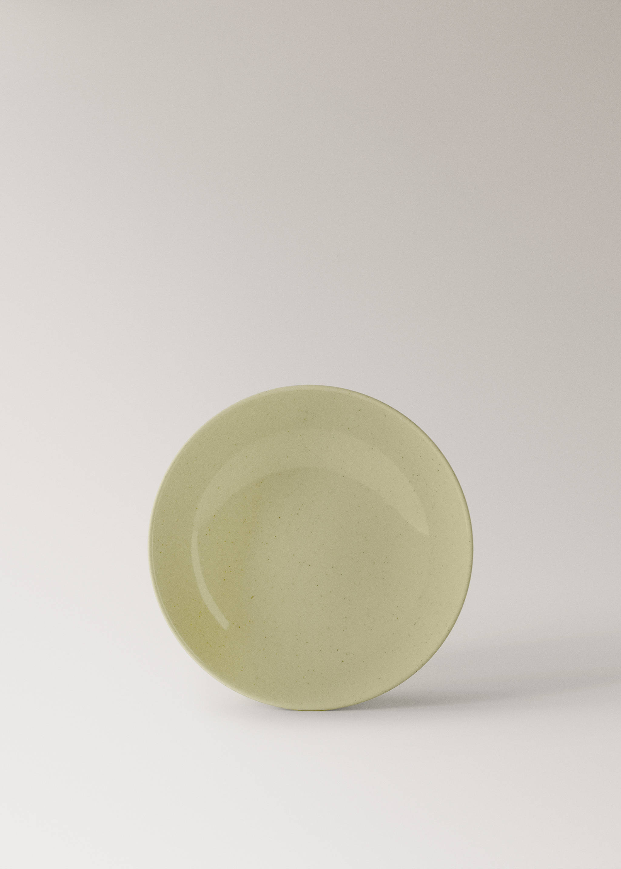 Deep stoneware plate with spots - Article without model