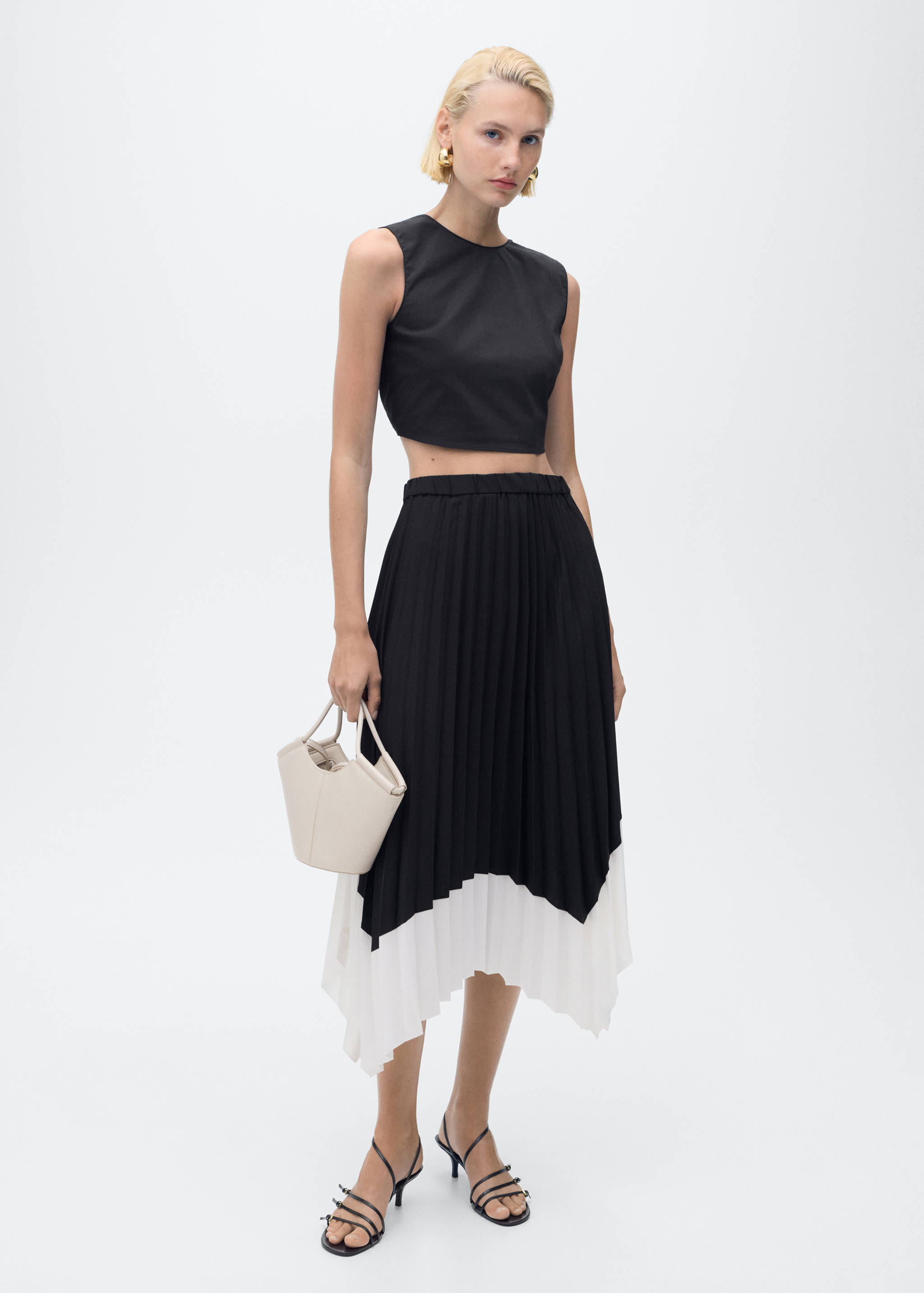 Pleated asymmetric skirt  - General plane