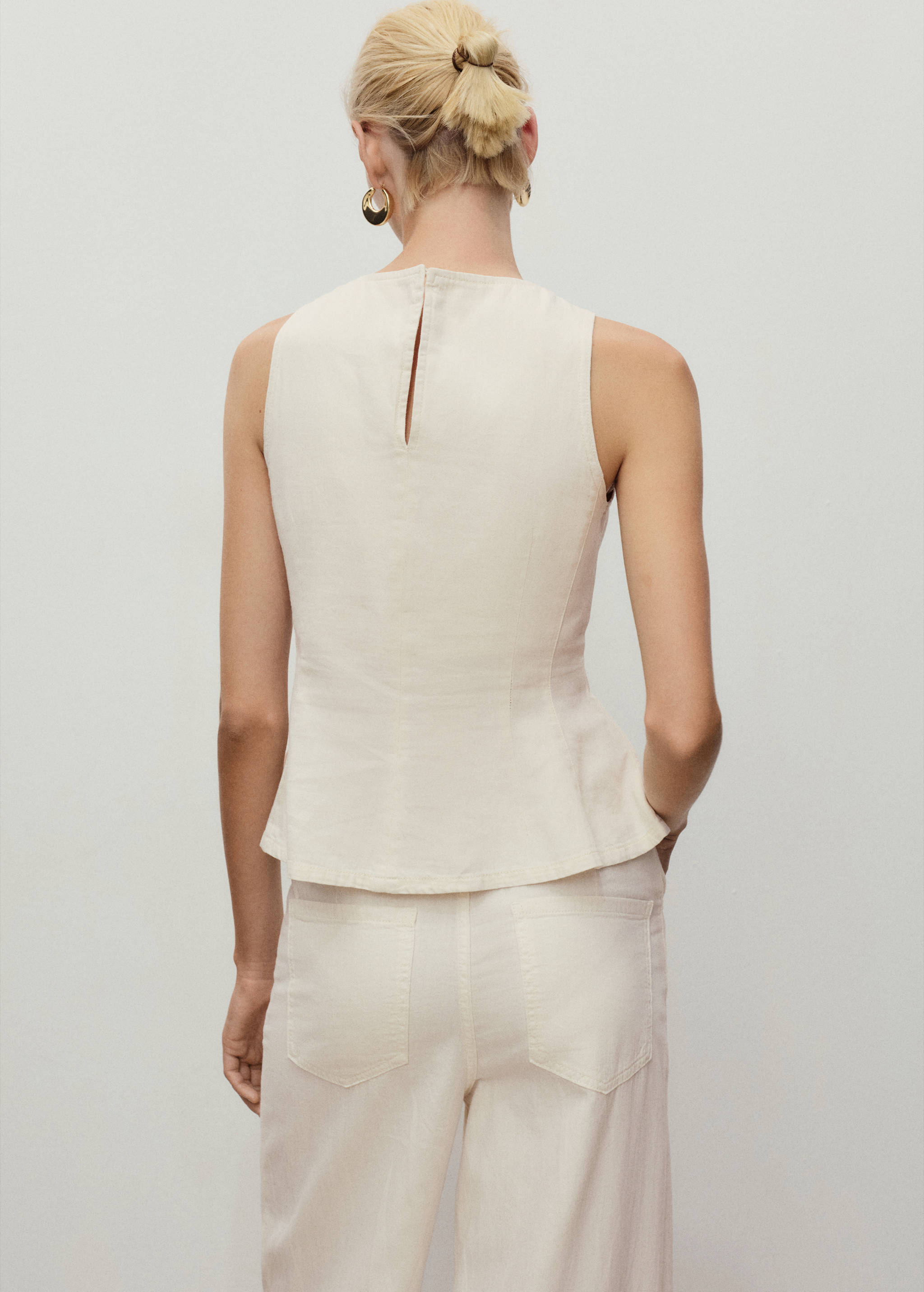 Ausgestelltes Denim-Top - Rückseite des Artikels