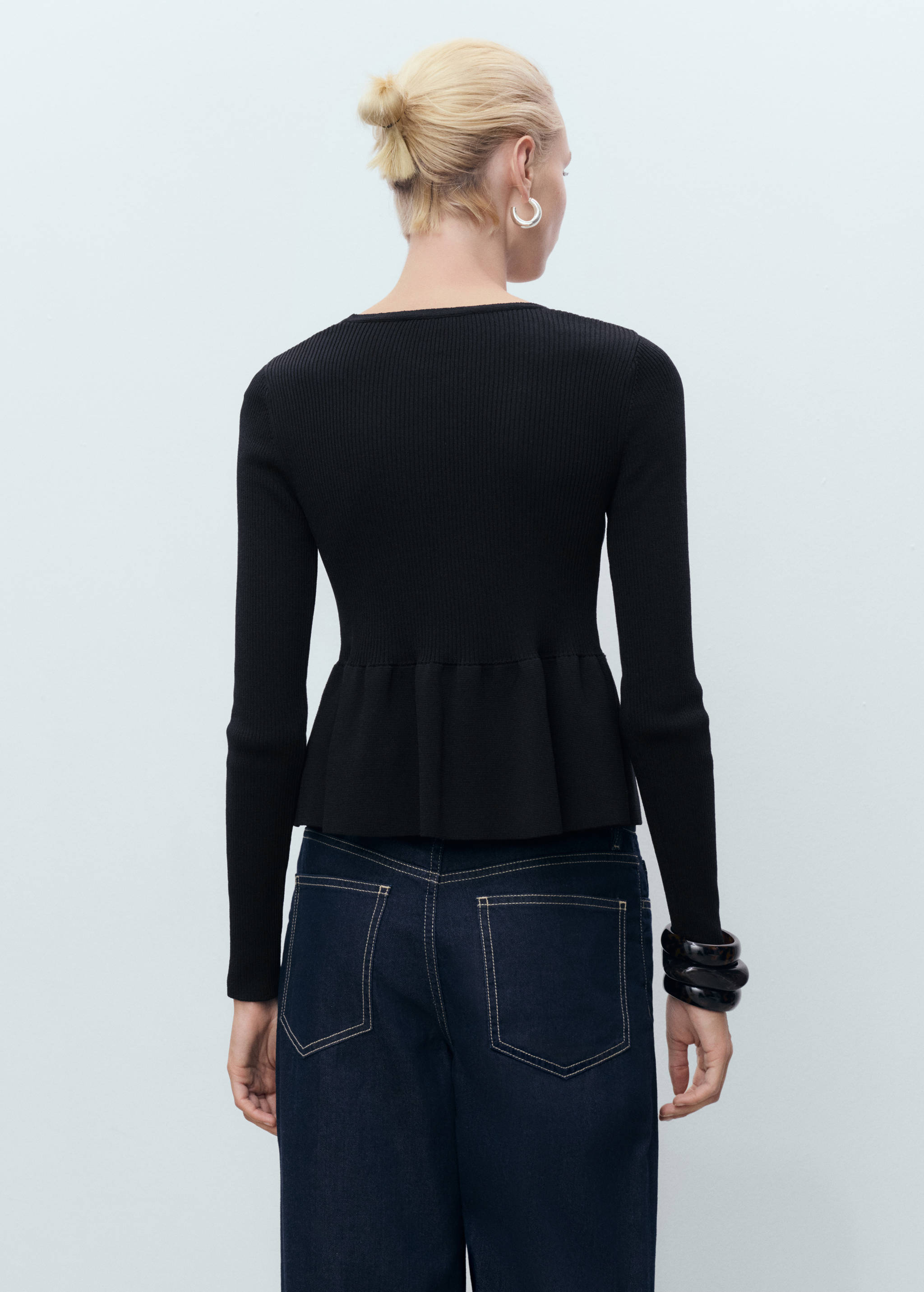 Knitted cardigan with ties - Reverse of the article