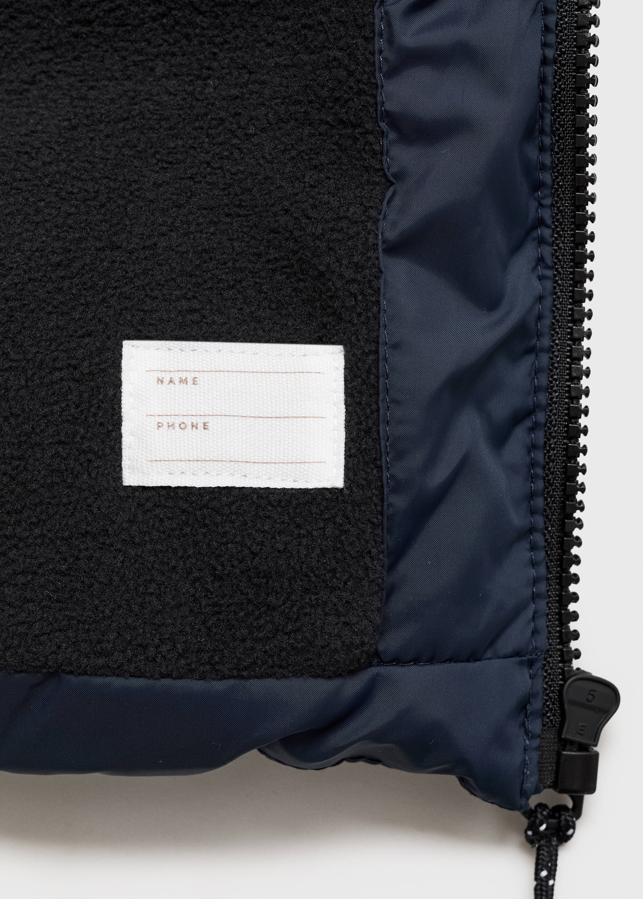 Langer Mantel mit gestepptem Futter - Detail des Artikels 0