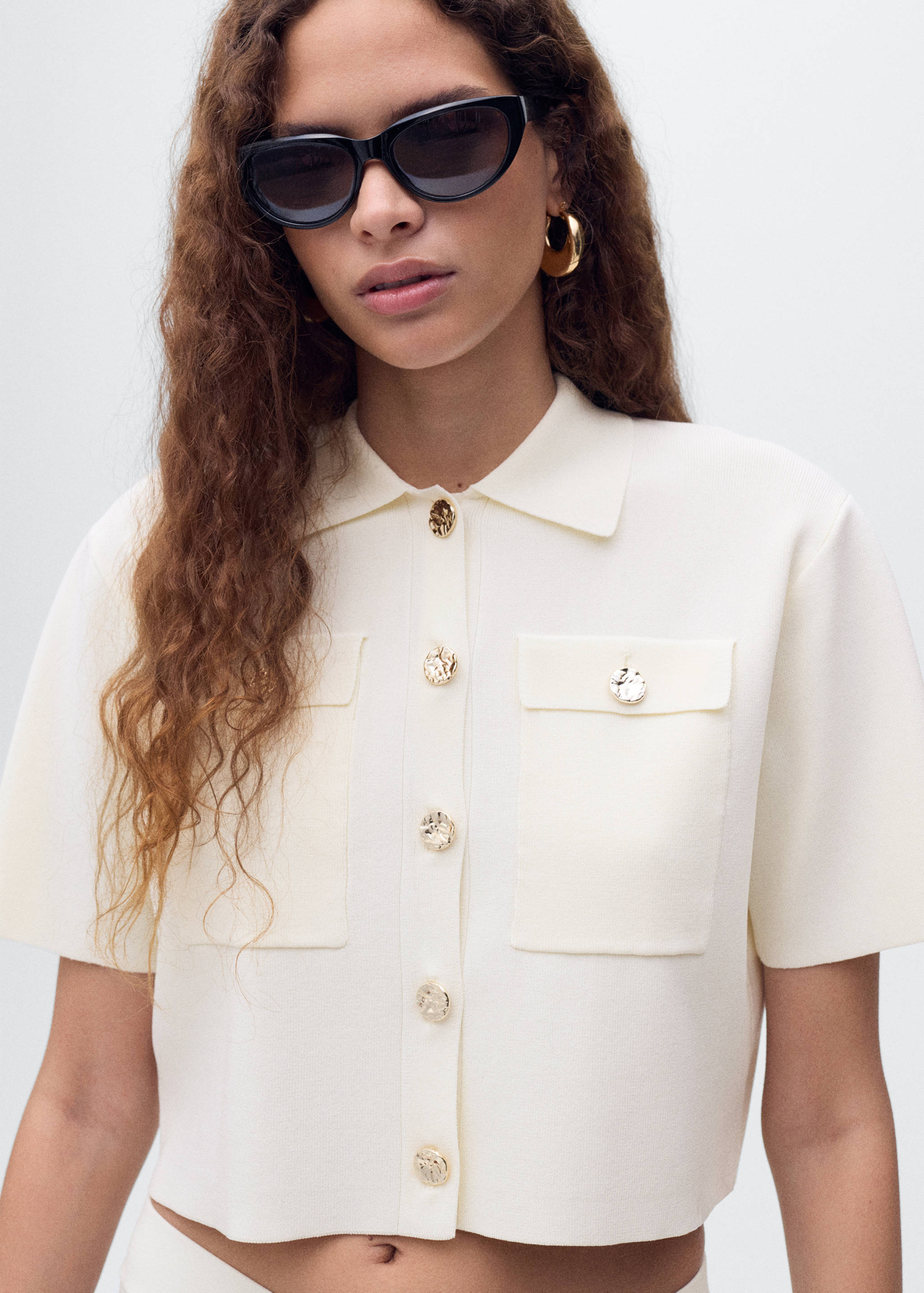 Short-sleeved knitted jacket - Medium plane