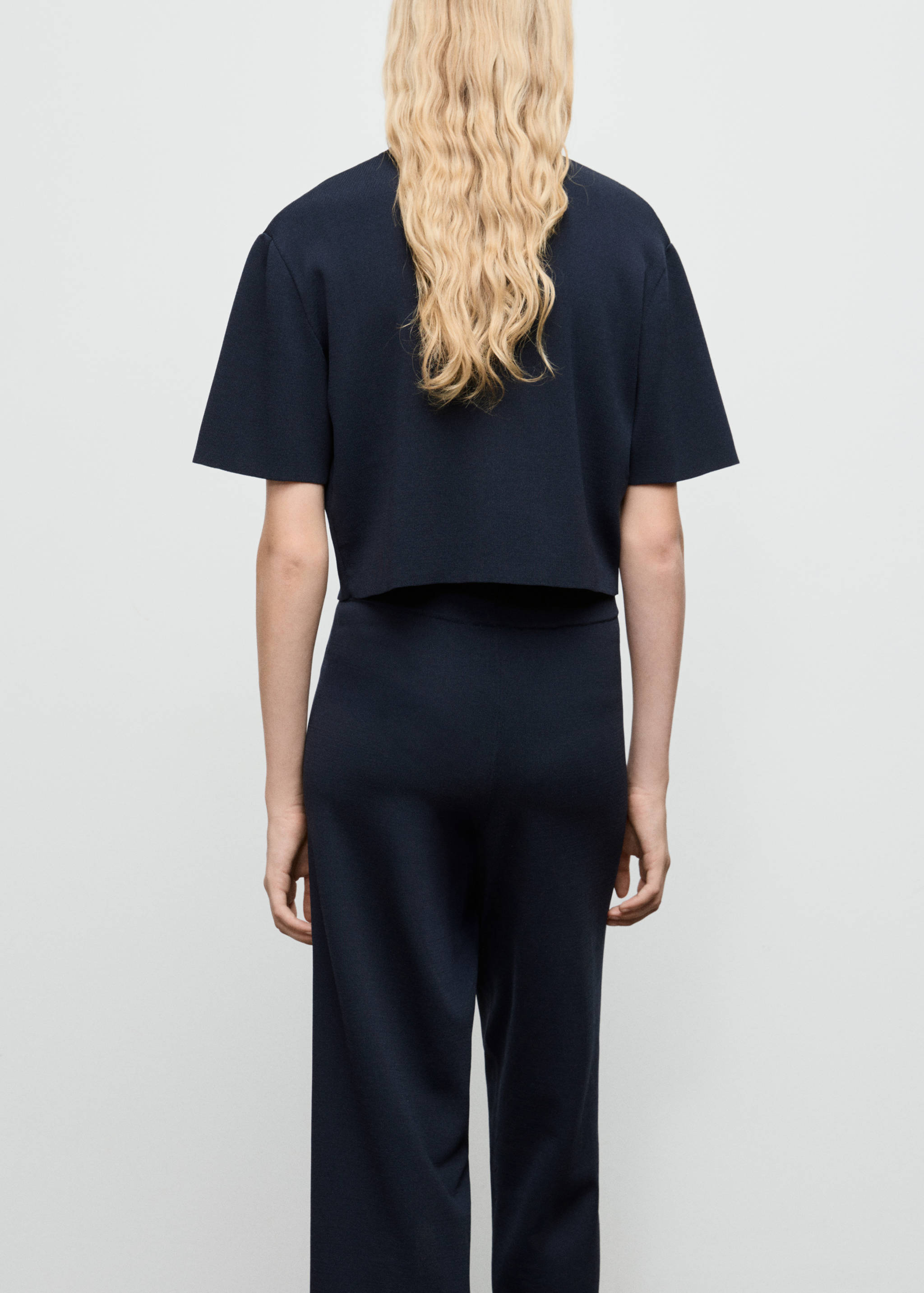 Short-sleeved knitted jacket - Reverse of the article