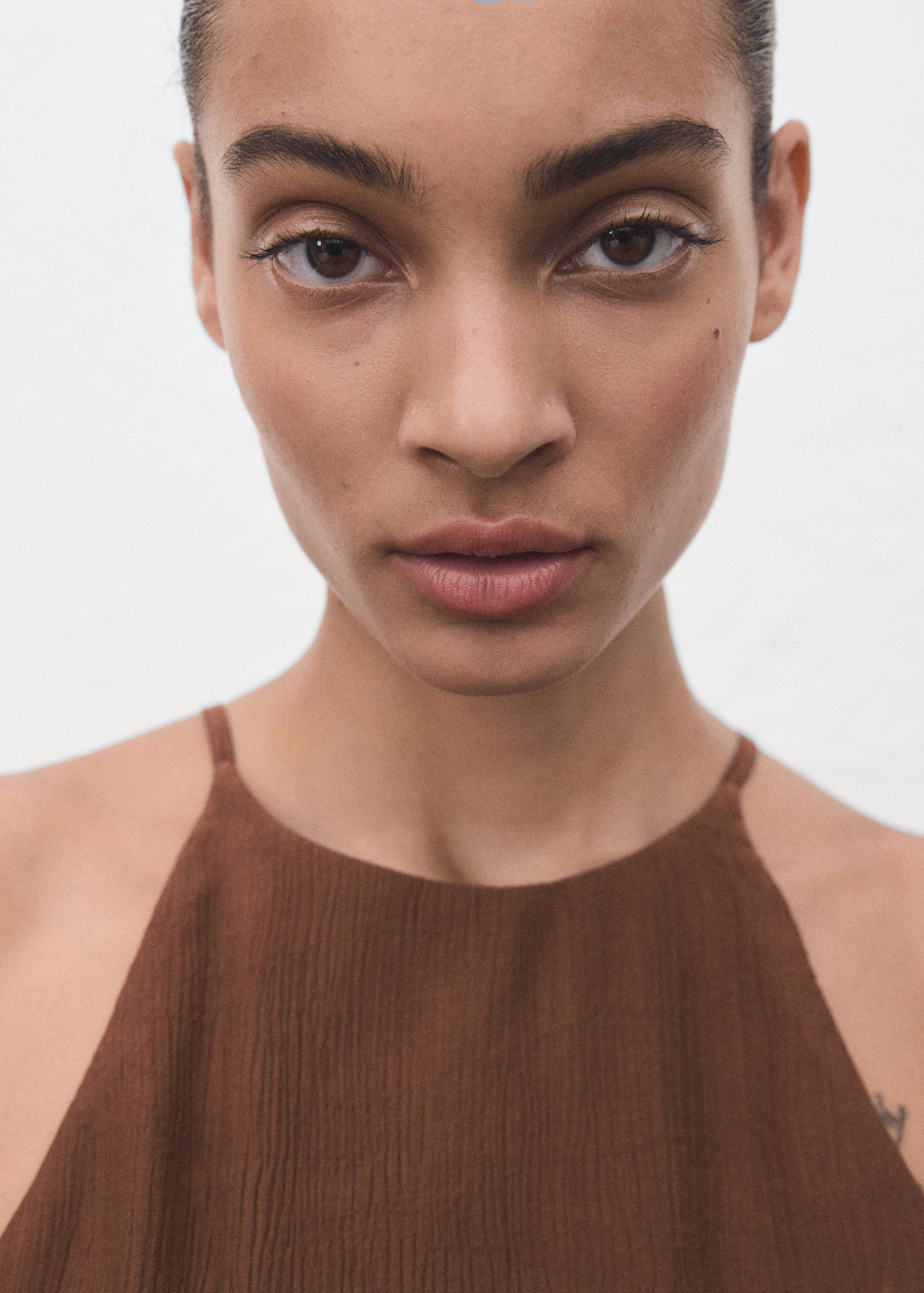 Pleated jumpsuit with belt - Details of the article 1