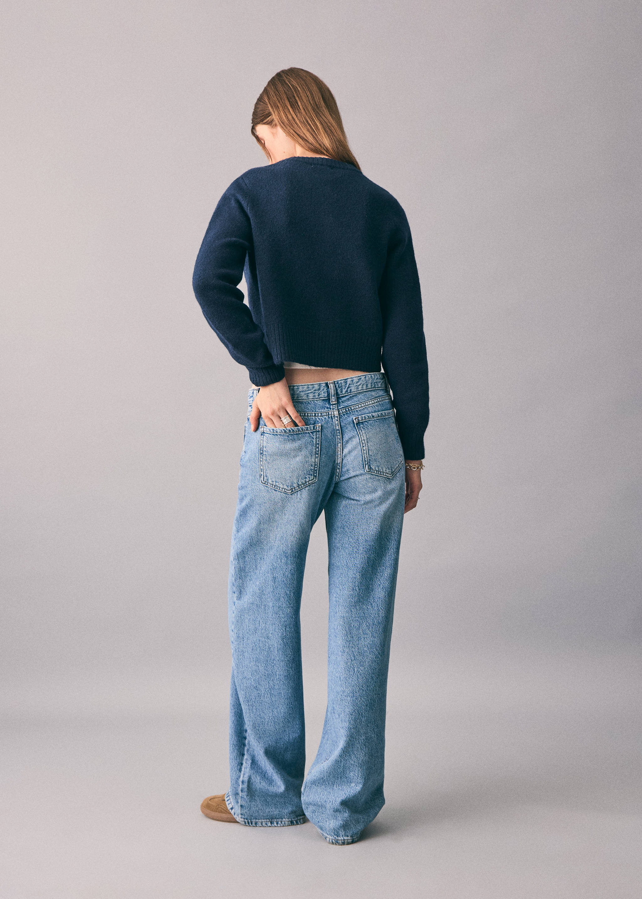Cross-waist jeans - Reverse of the article