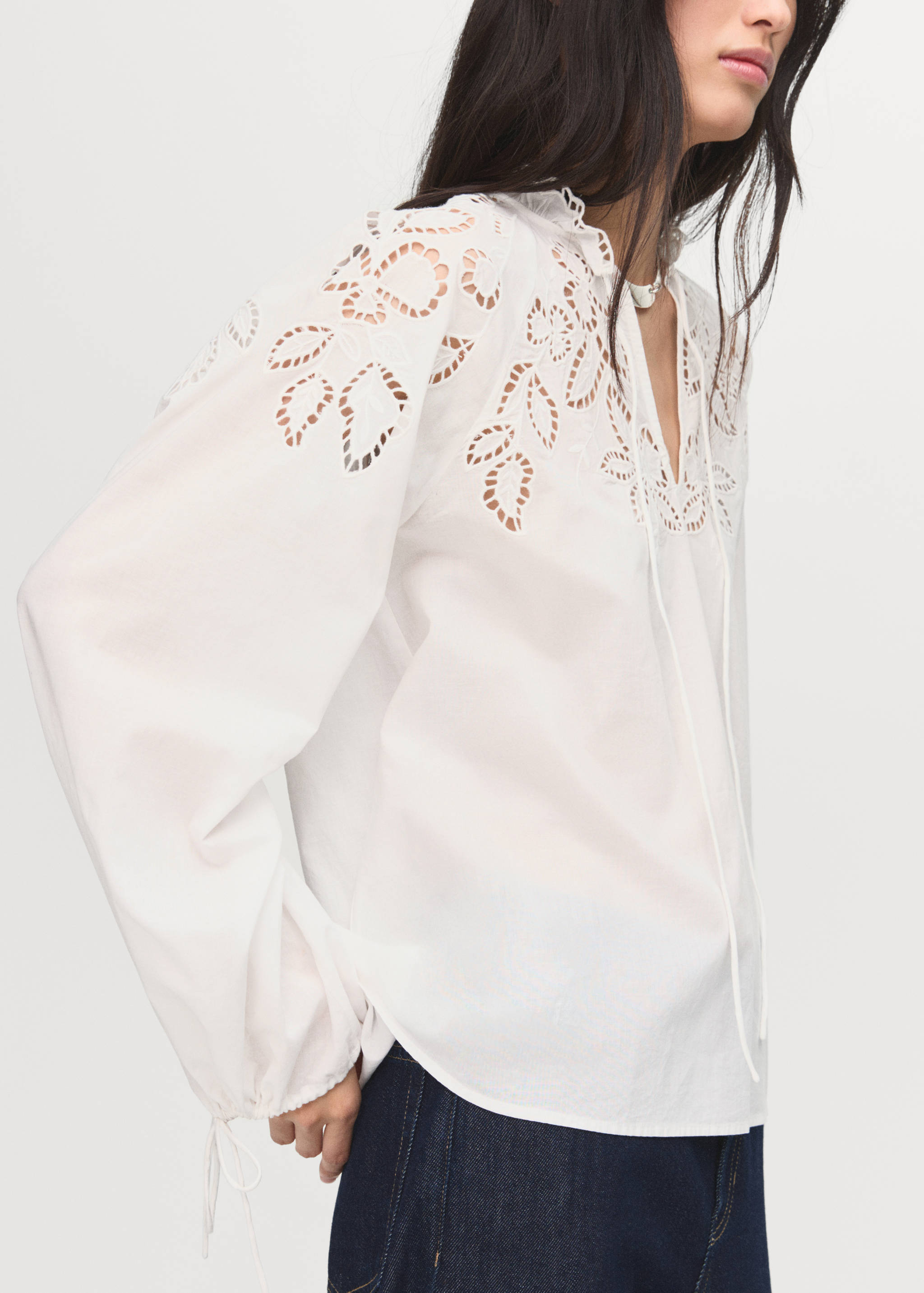 Embroidered blouse with bows - Details of the article 1