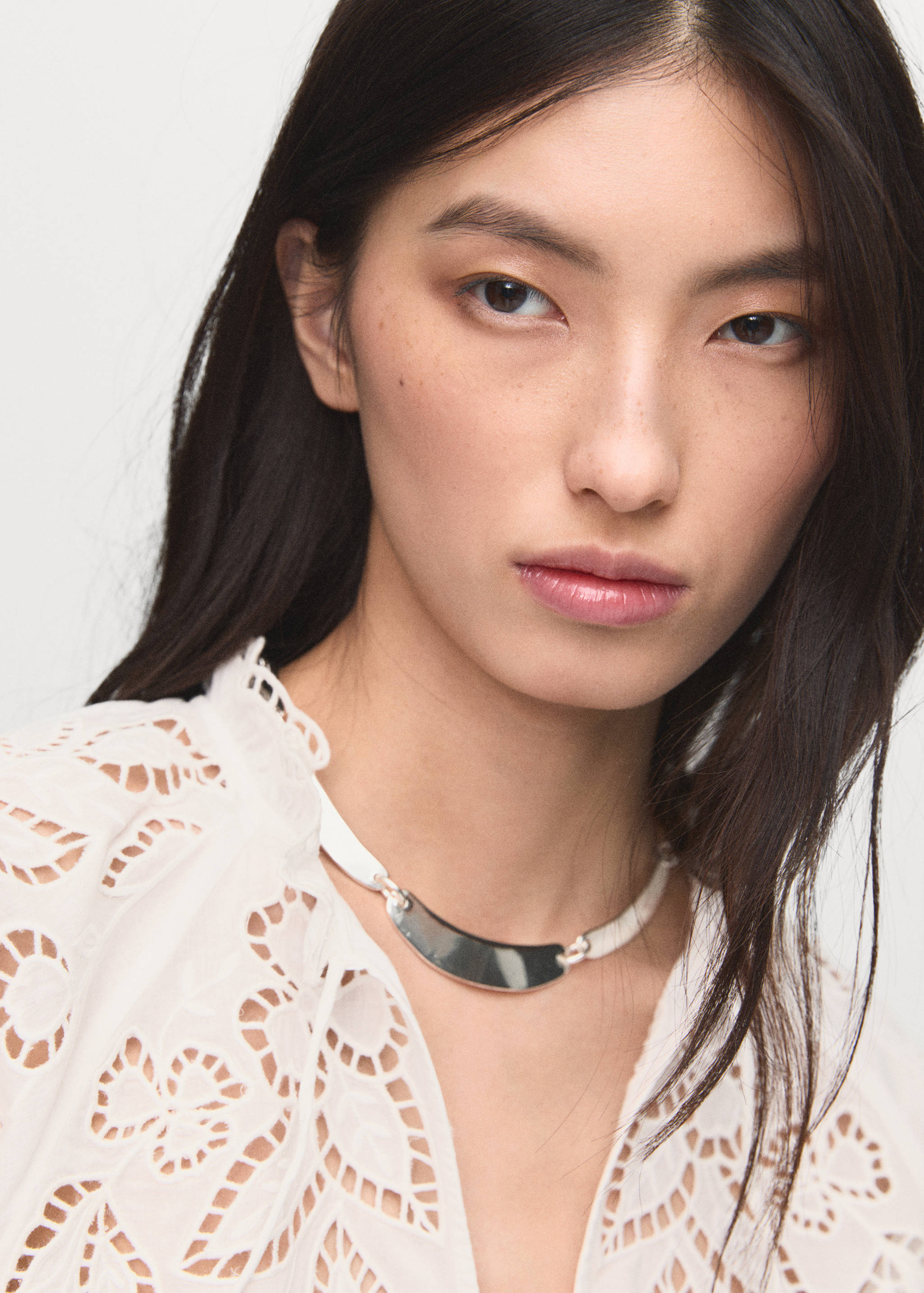 Embroidered blouse with bows - Details of the article 6