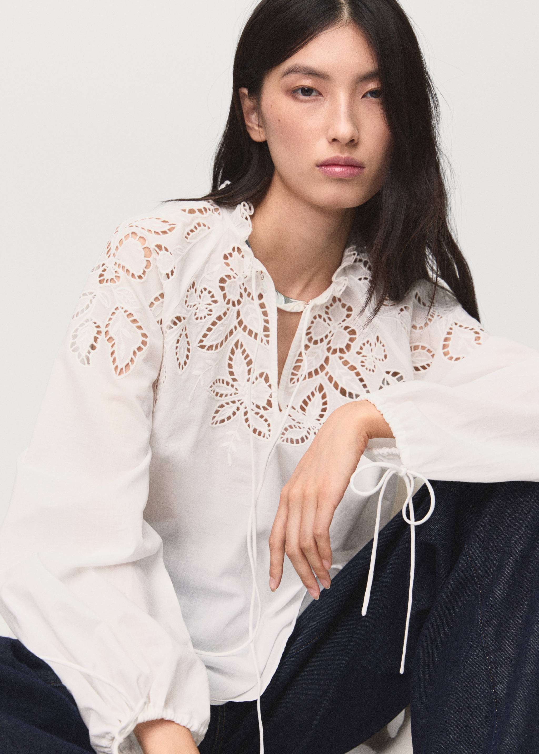 Embroidered blouse with bows - Details of the article 2