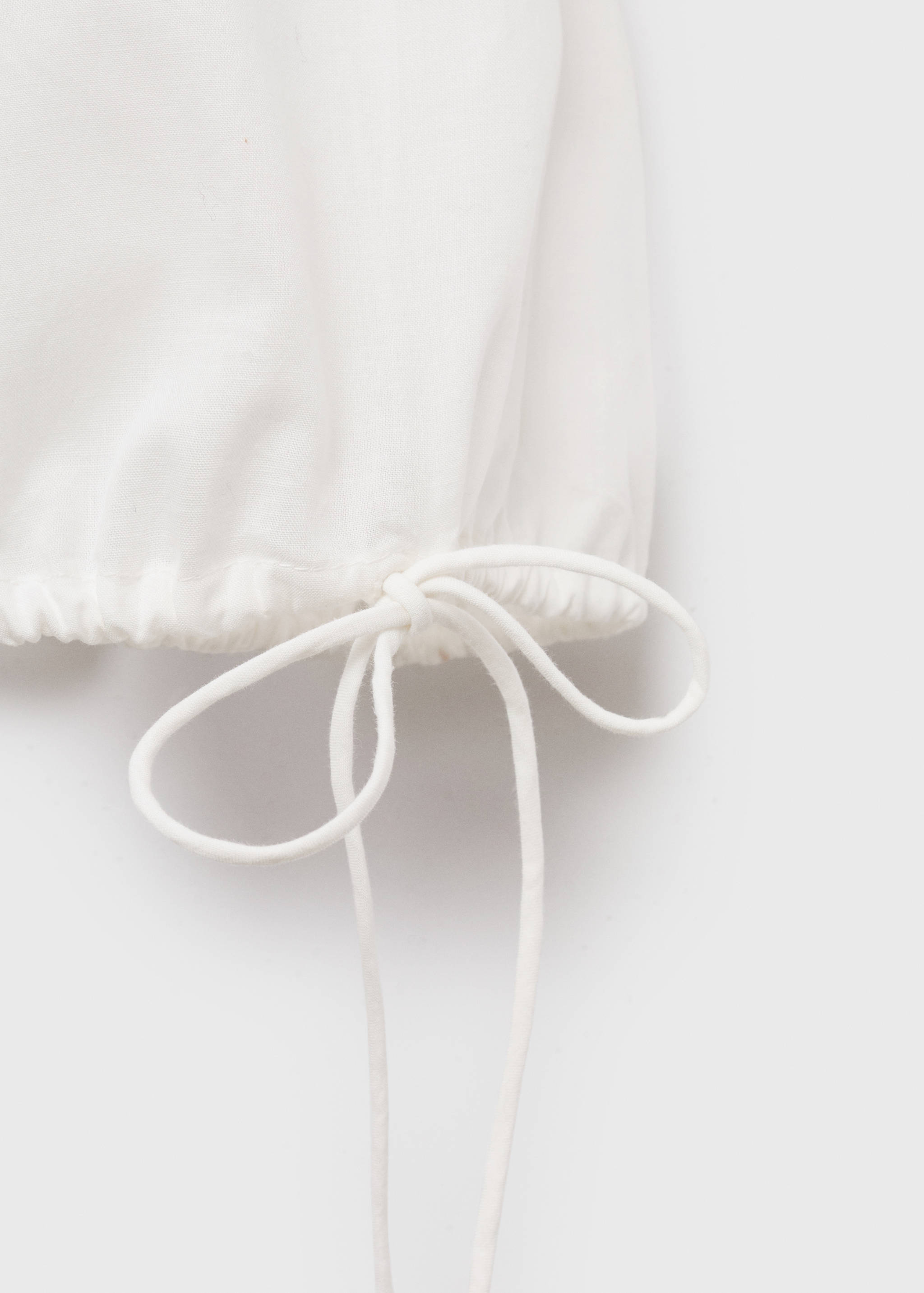 Embroidered blouse with bows - Details of the article 0