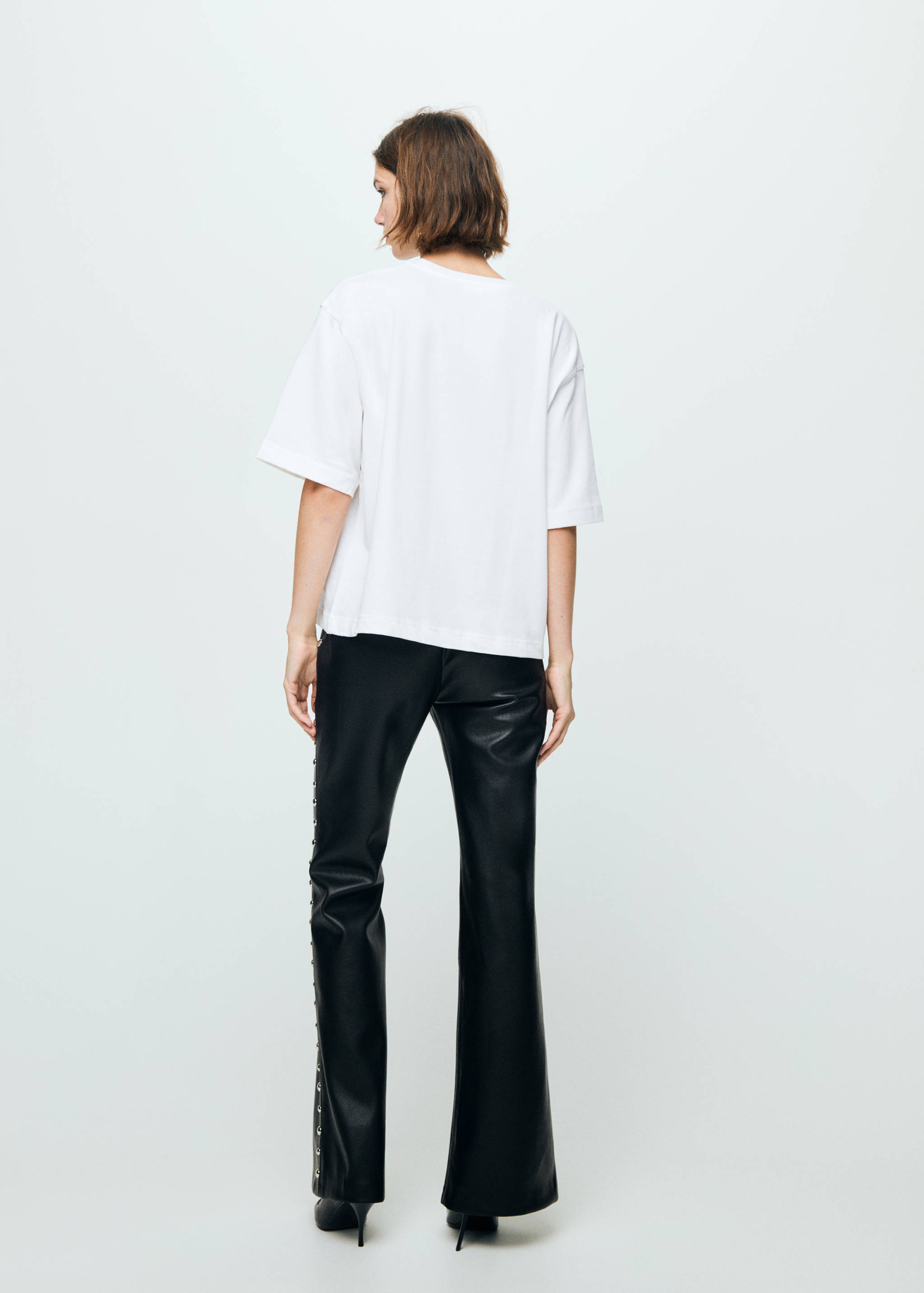 Studded faux-leather trousers - Reverse of the article
