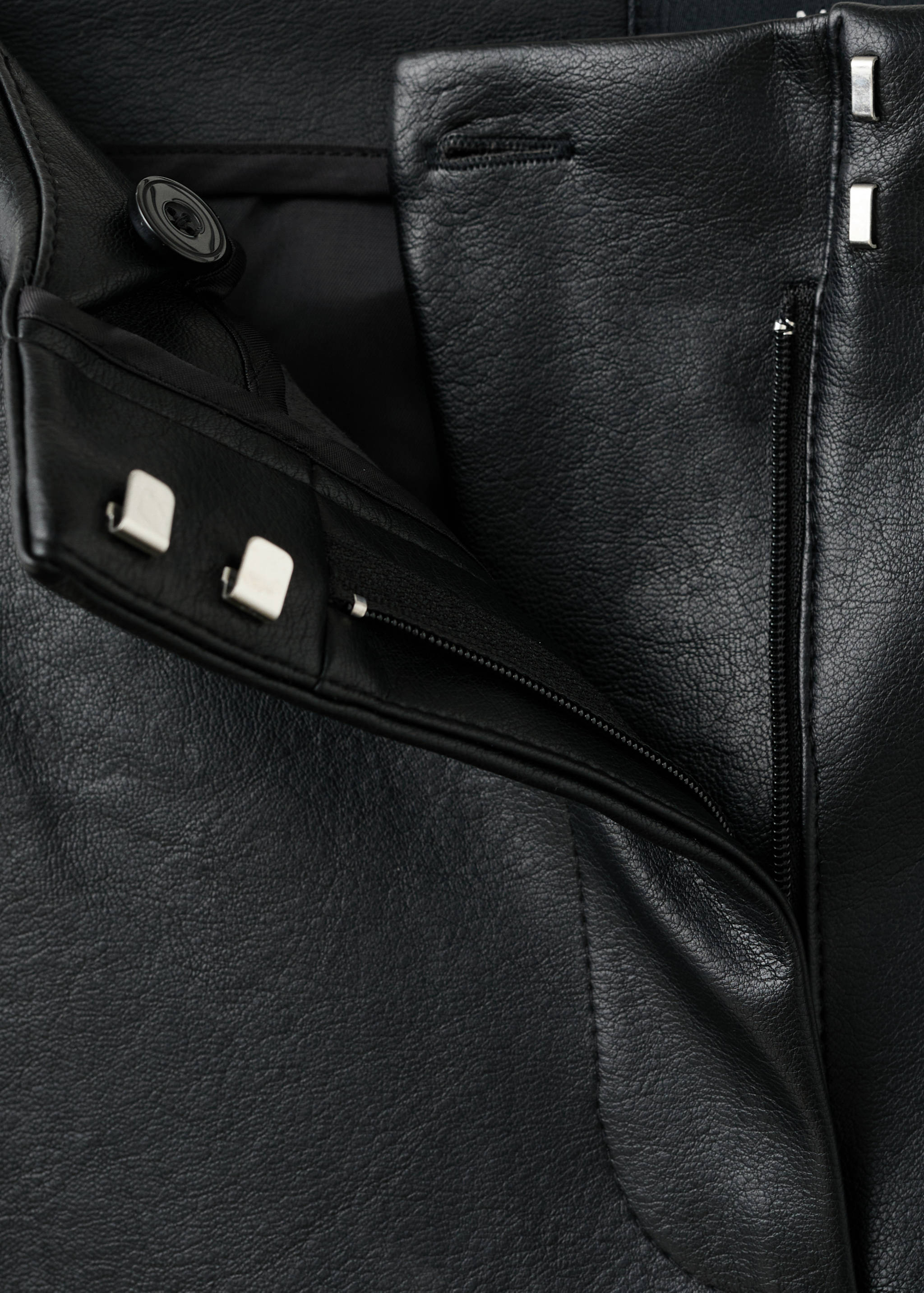 Studded faux-leather trousers - Details of the article 8