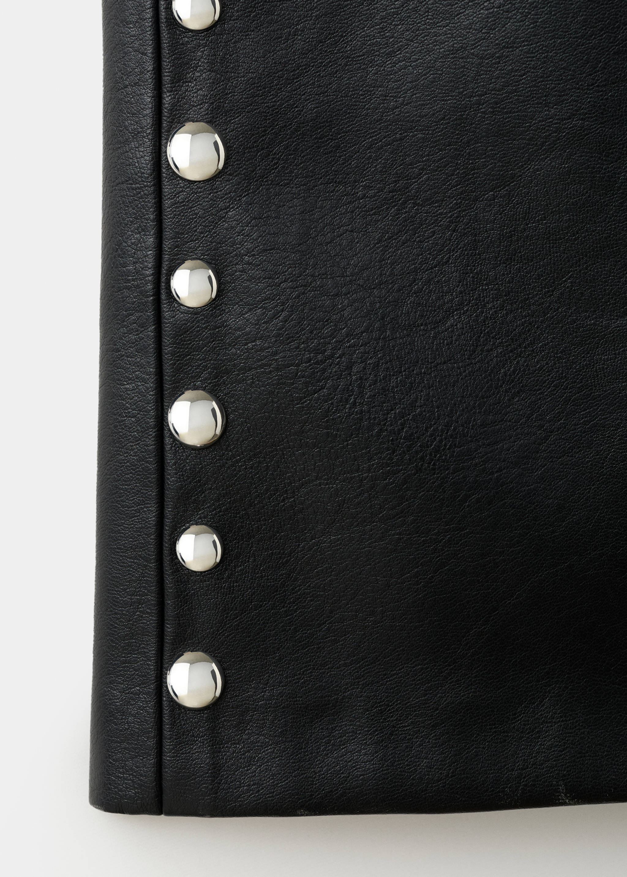 Studded faux-leather trousers - Details of the article 0