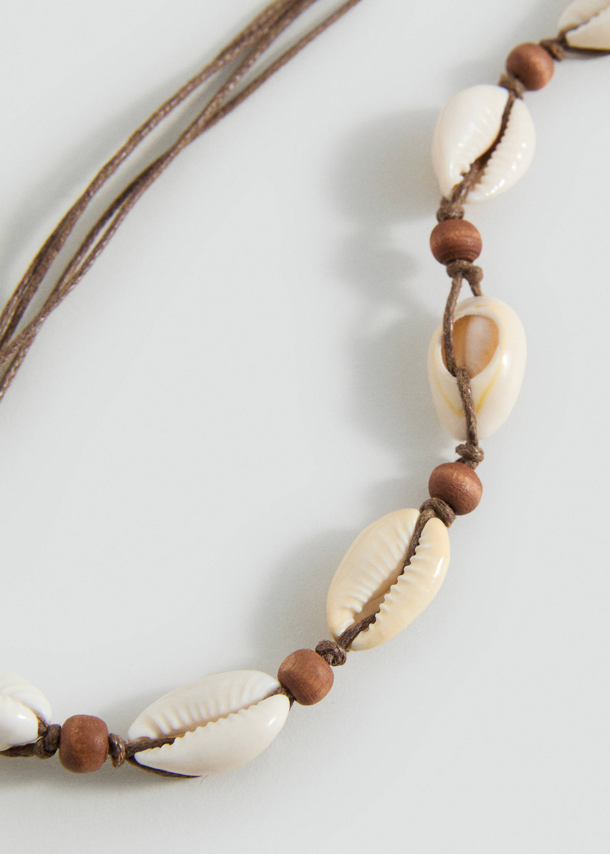 Collier coquillages - Plan moyen