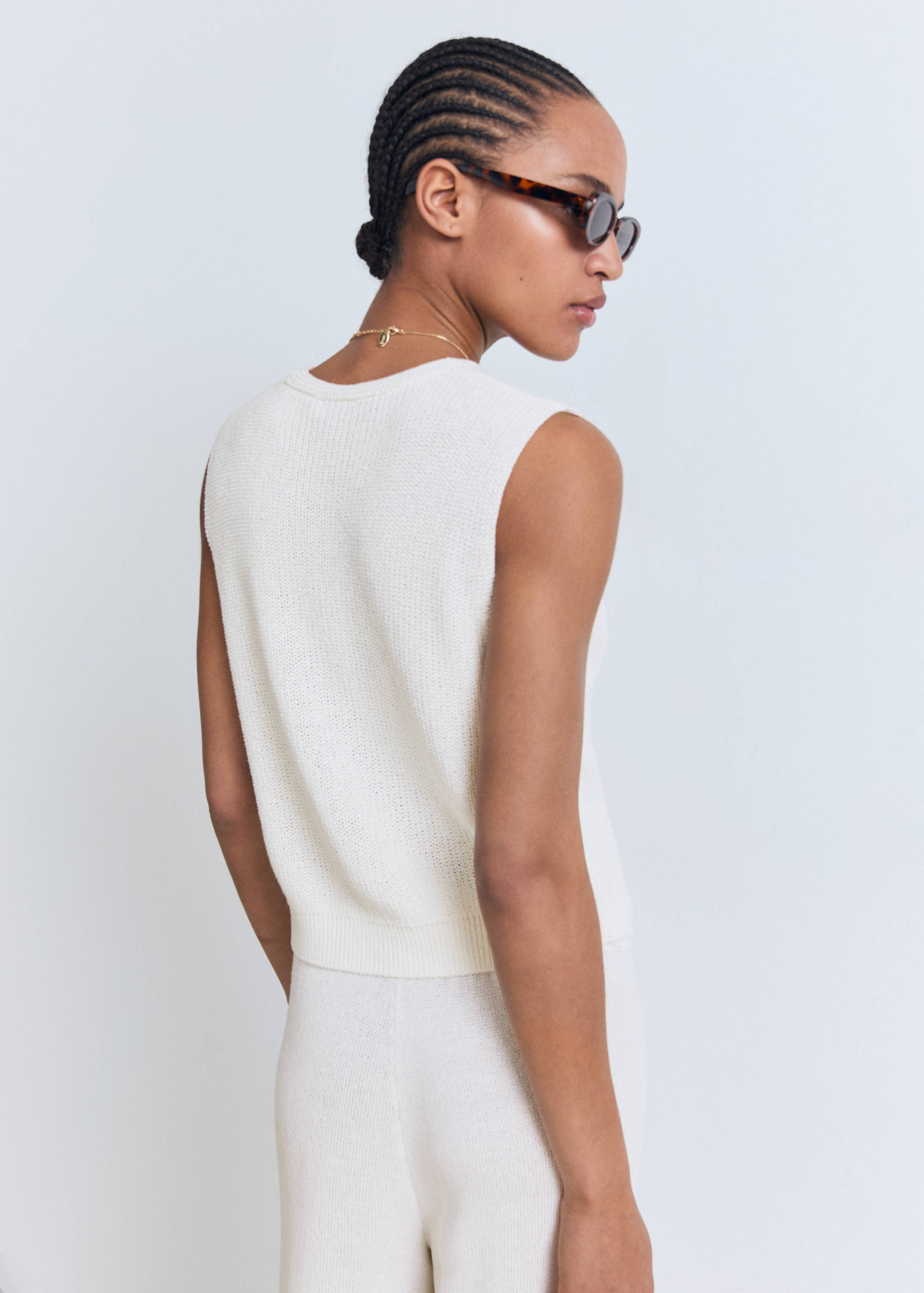 Vestă din tricot ajurată - Spatele articolului