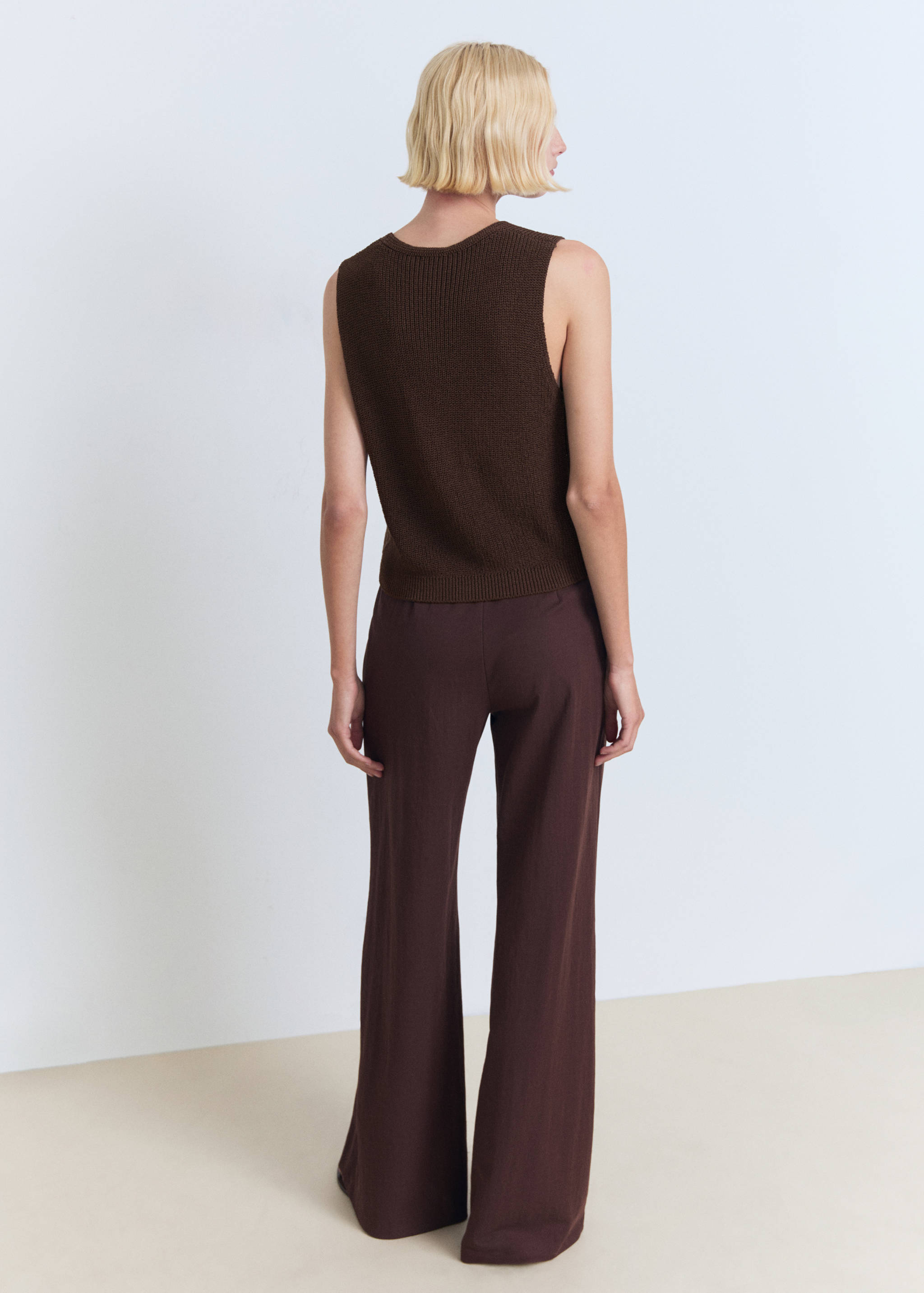 Knitted vest with lace pattern - Reverse of the article