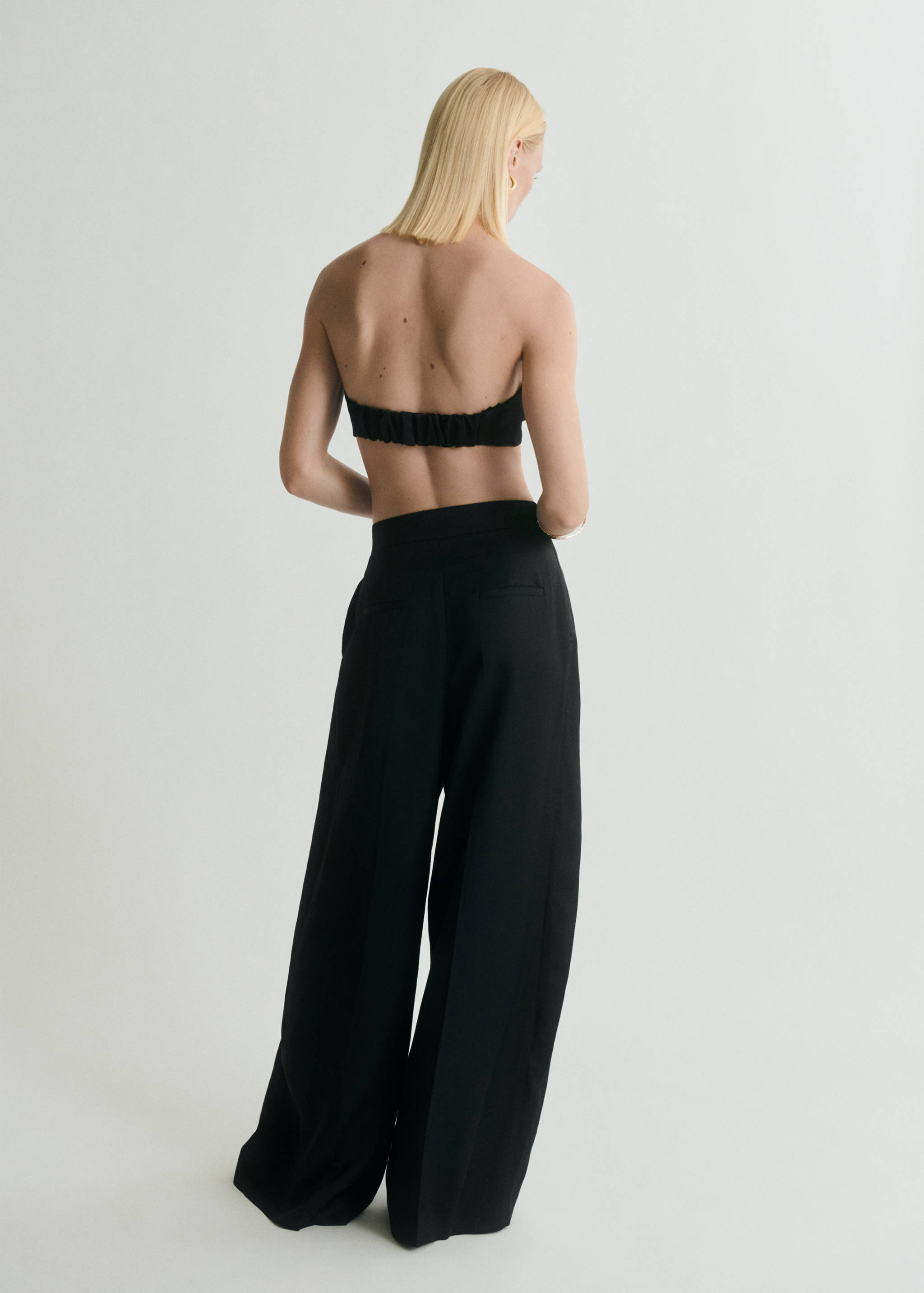 Wide leg pleated trousers - Reverse of the article