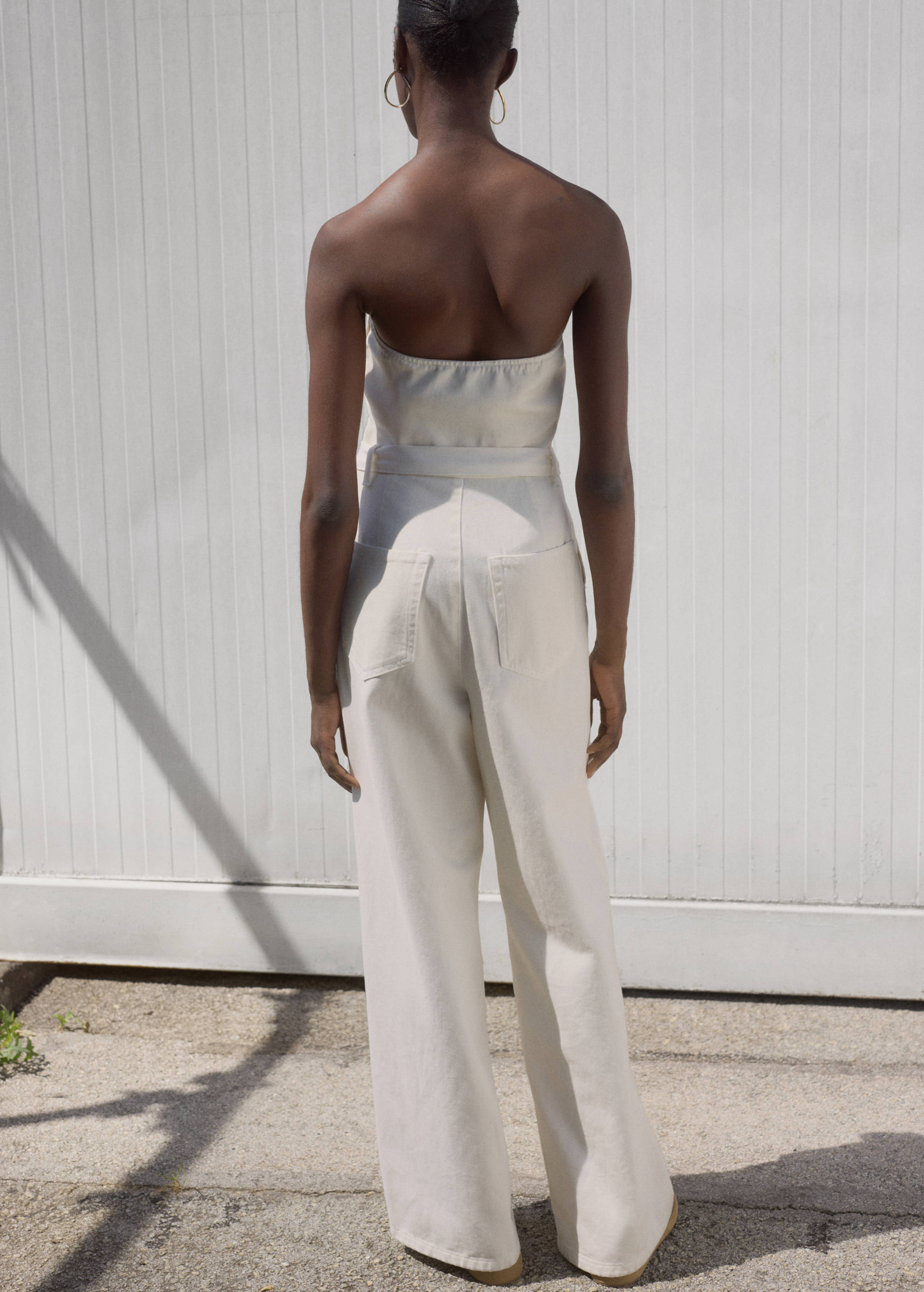 Kombinezon dżinsowy z paskiem - Tylna strona artykułu