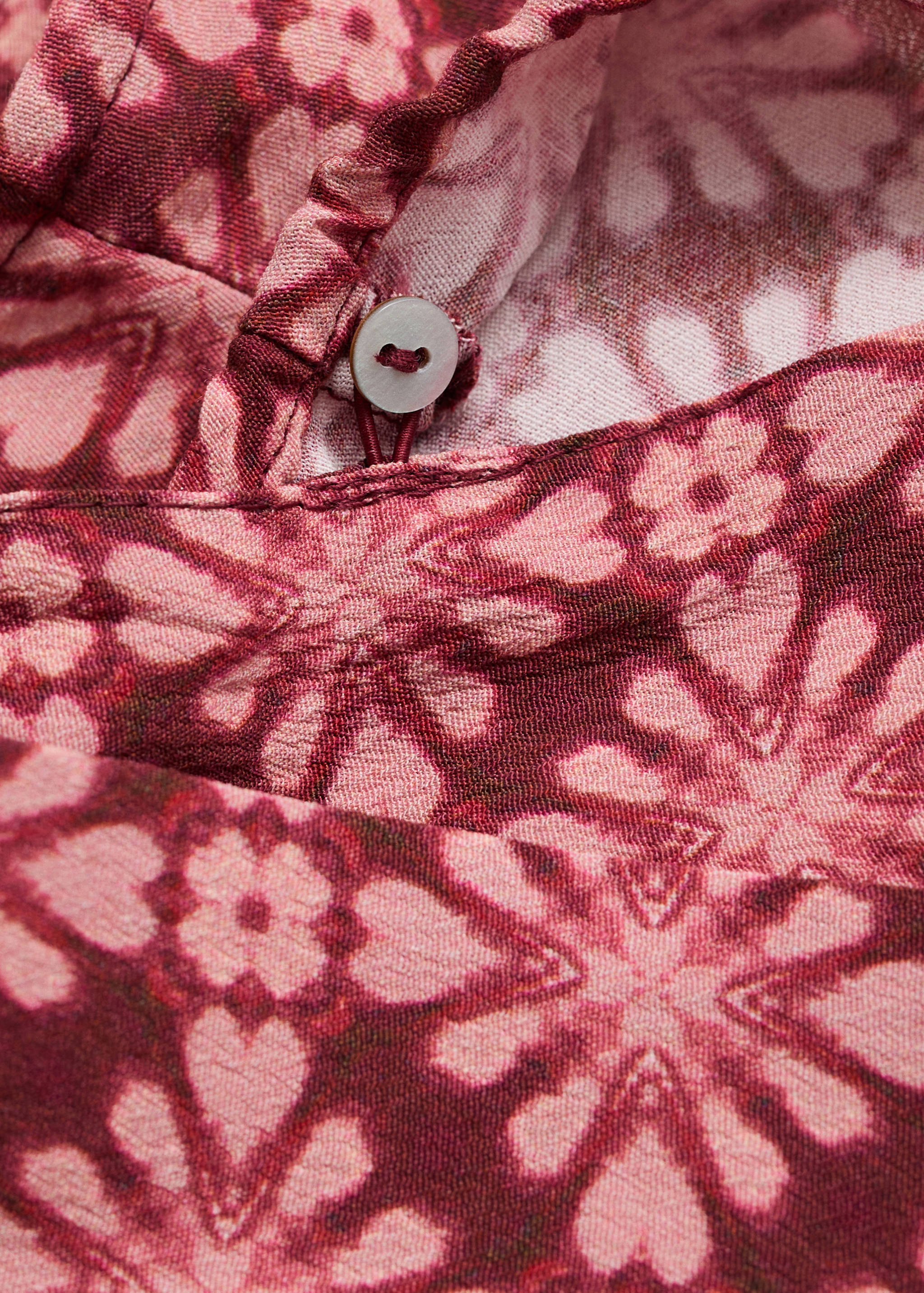 Blusa assimétrica com laço na gola - Pormenor do artigo 0