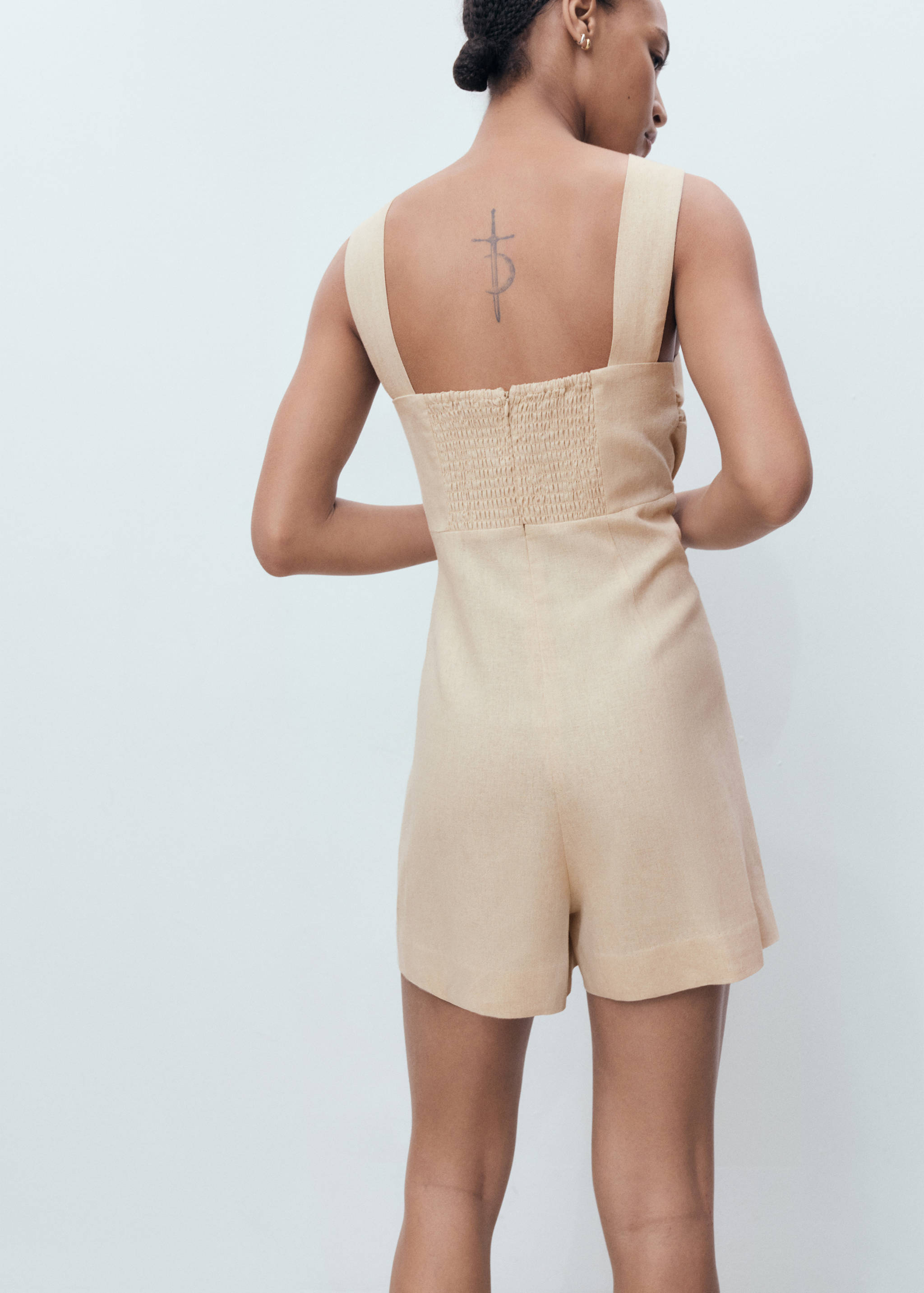 Linen jumpsuit with hoop detail - Reverse of the article