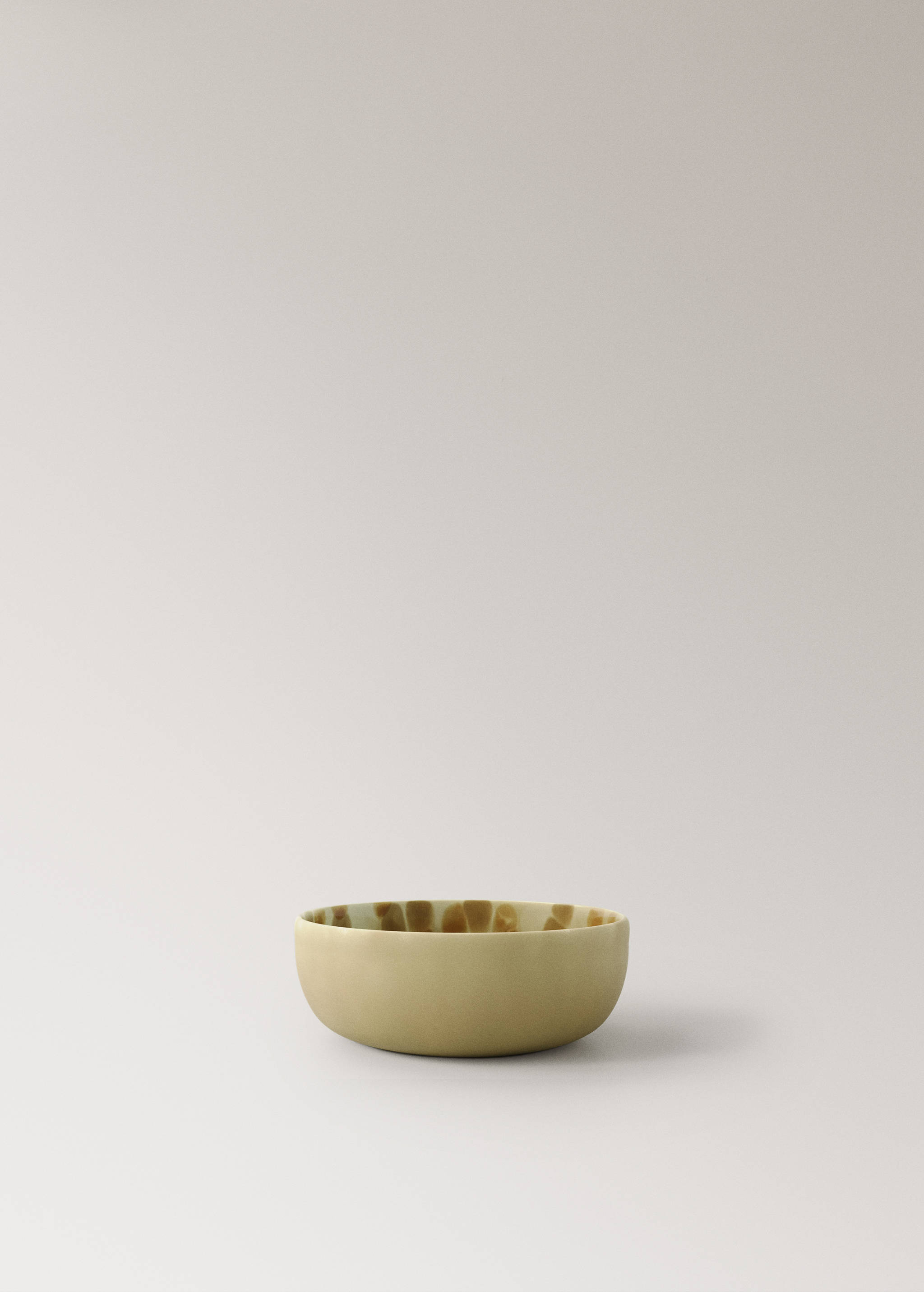 Reactive stoneware bowl with spots - Article without model