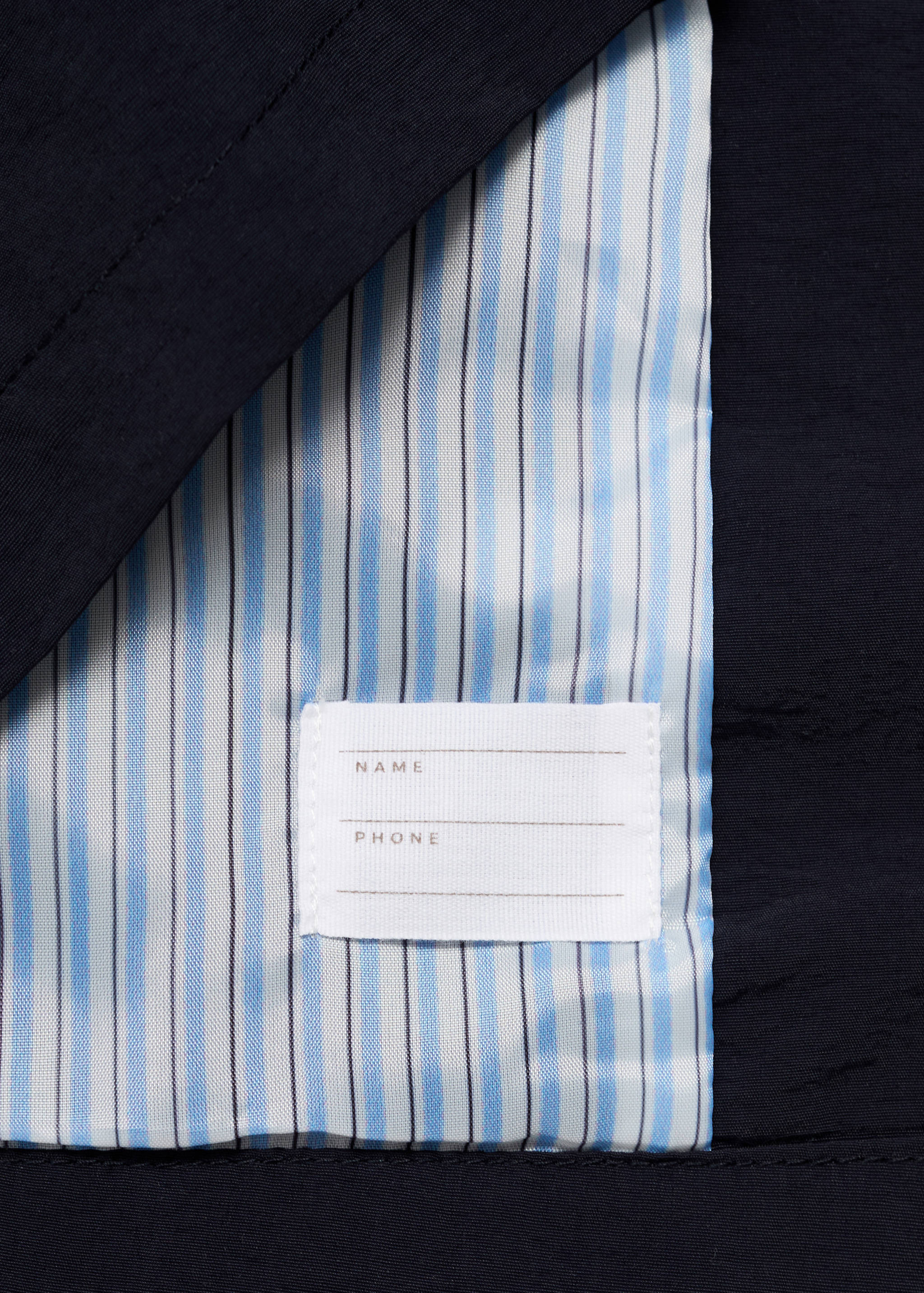 Trench coat with button detail - Details of the article 8