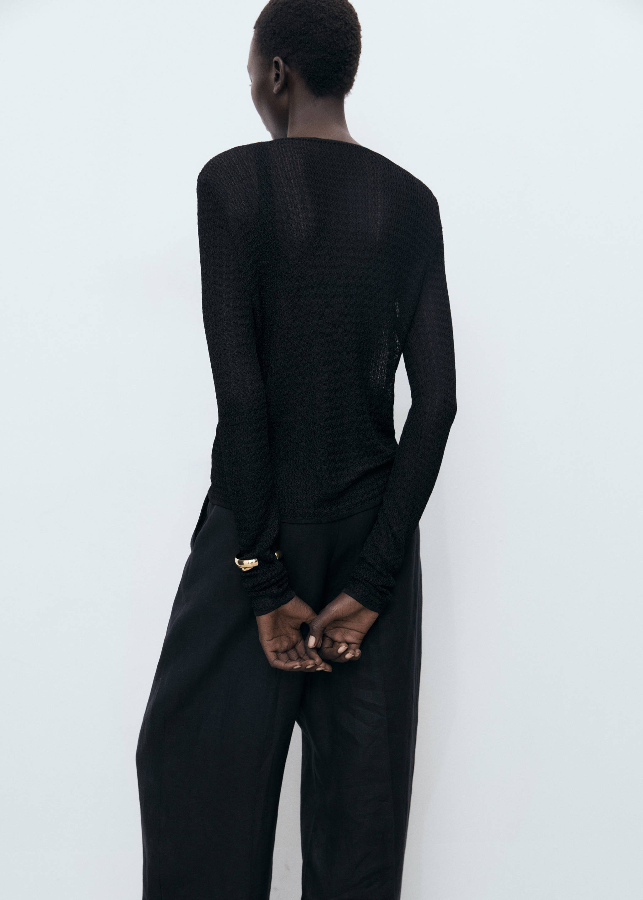 Knitted cardigan with ties - Reverse of the article