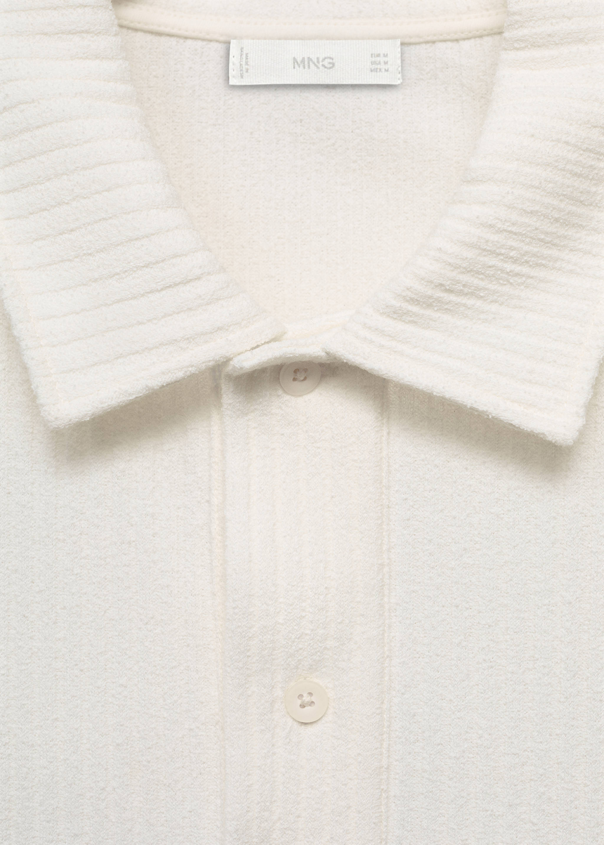 Textured knitted polo shirt - Details of the article 8