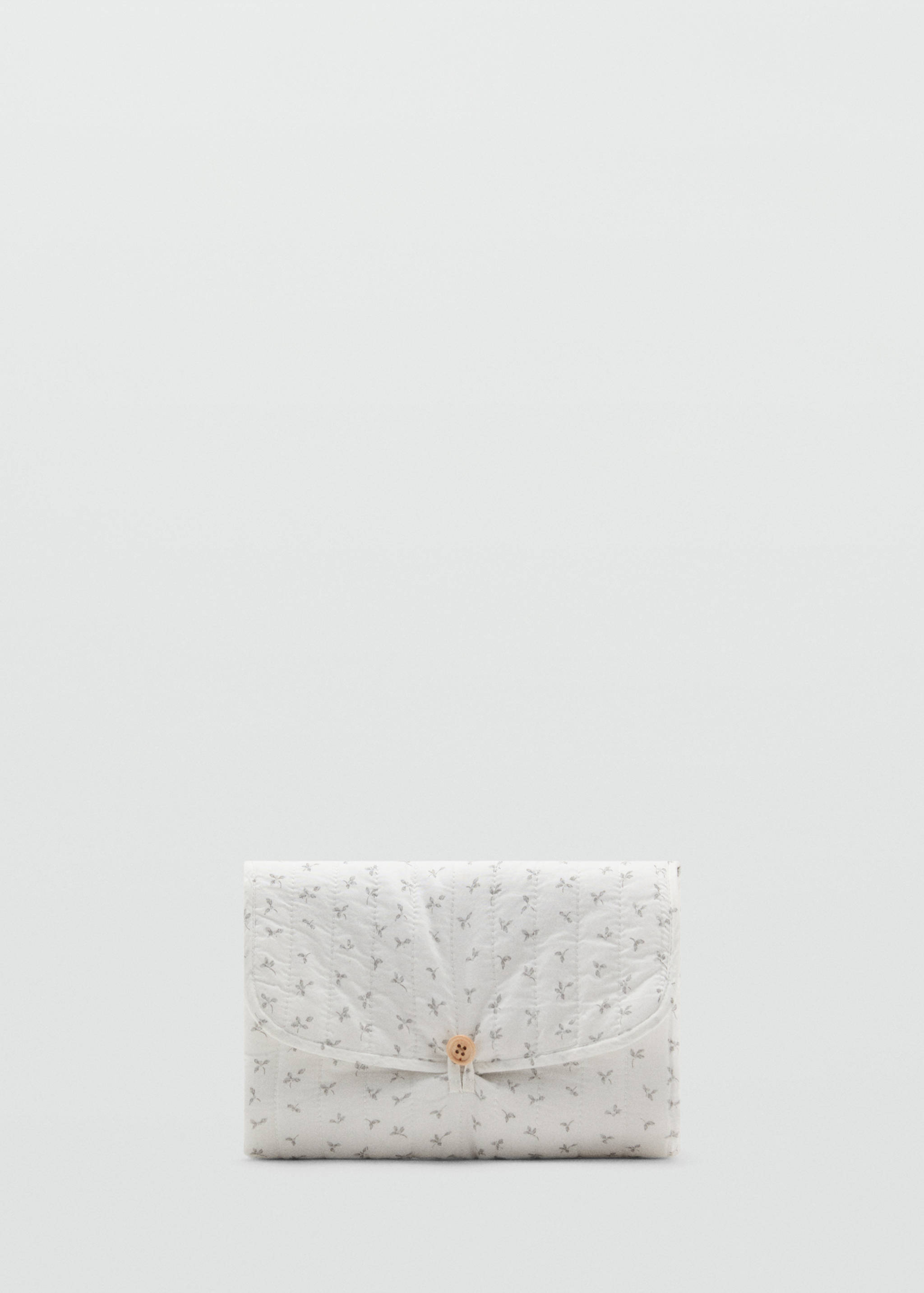 Cambiador de viaje flores - Artículo sin modelo