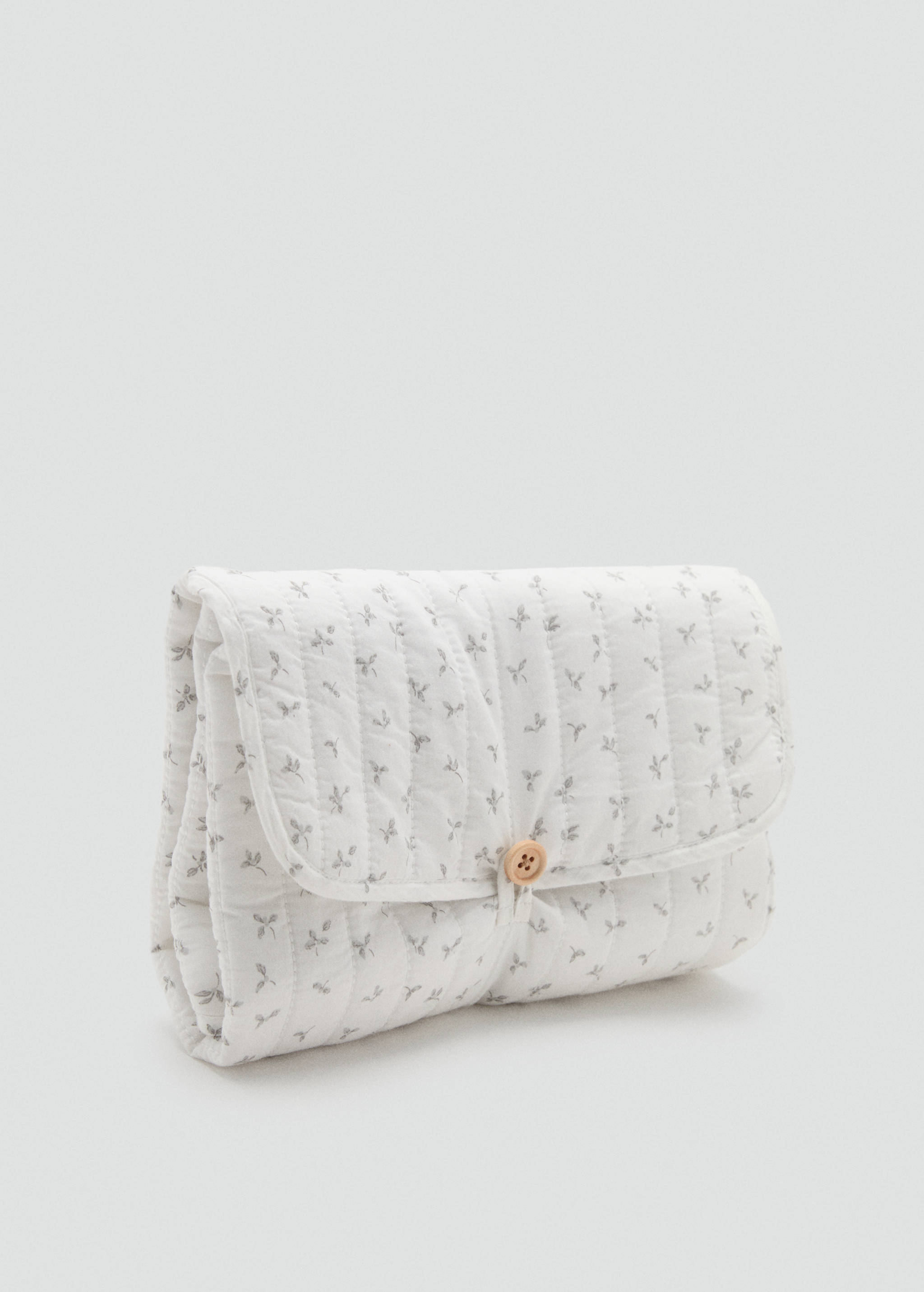 Cambiador de viaje flores - Plano medio