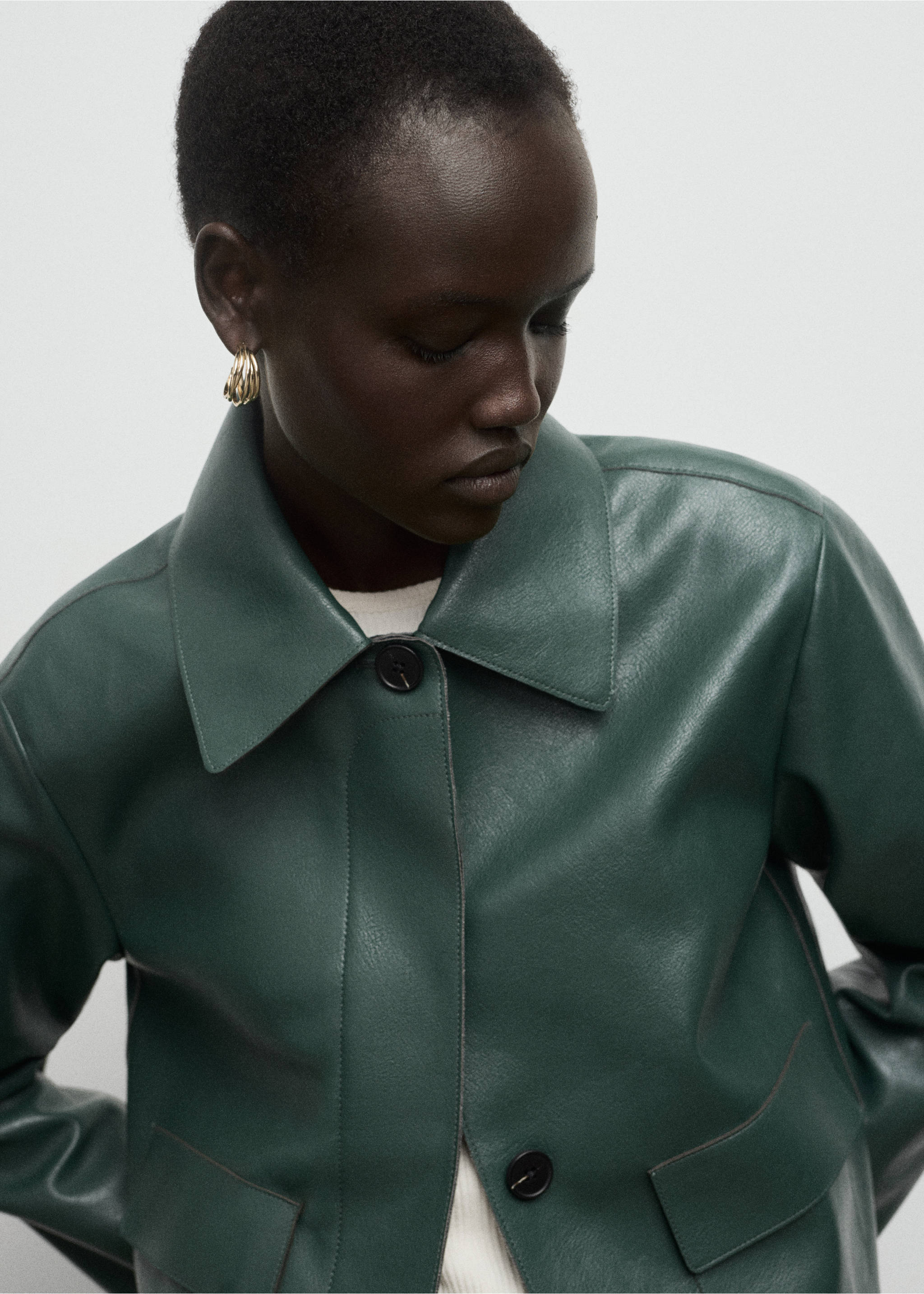 Faux-leather jacket with pockets - Details of the article 1, Green. Ref: 17094433-00.