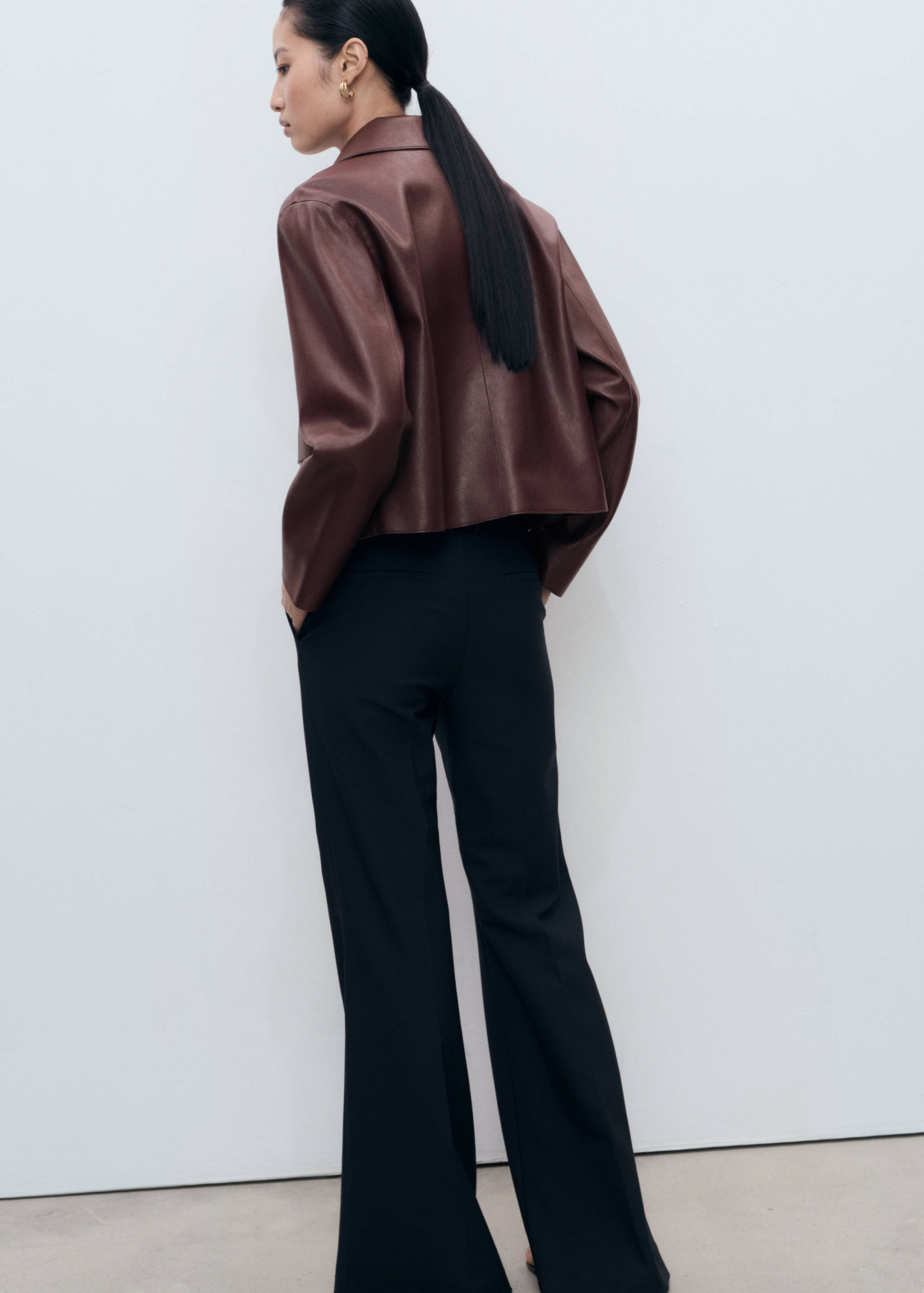 Veste cuir synthétique poches - Verso de l’article