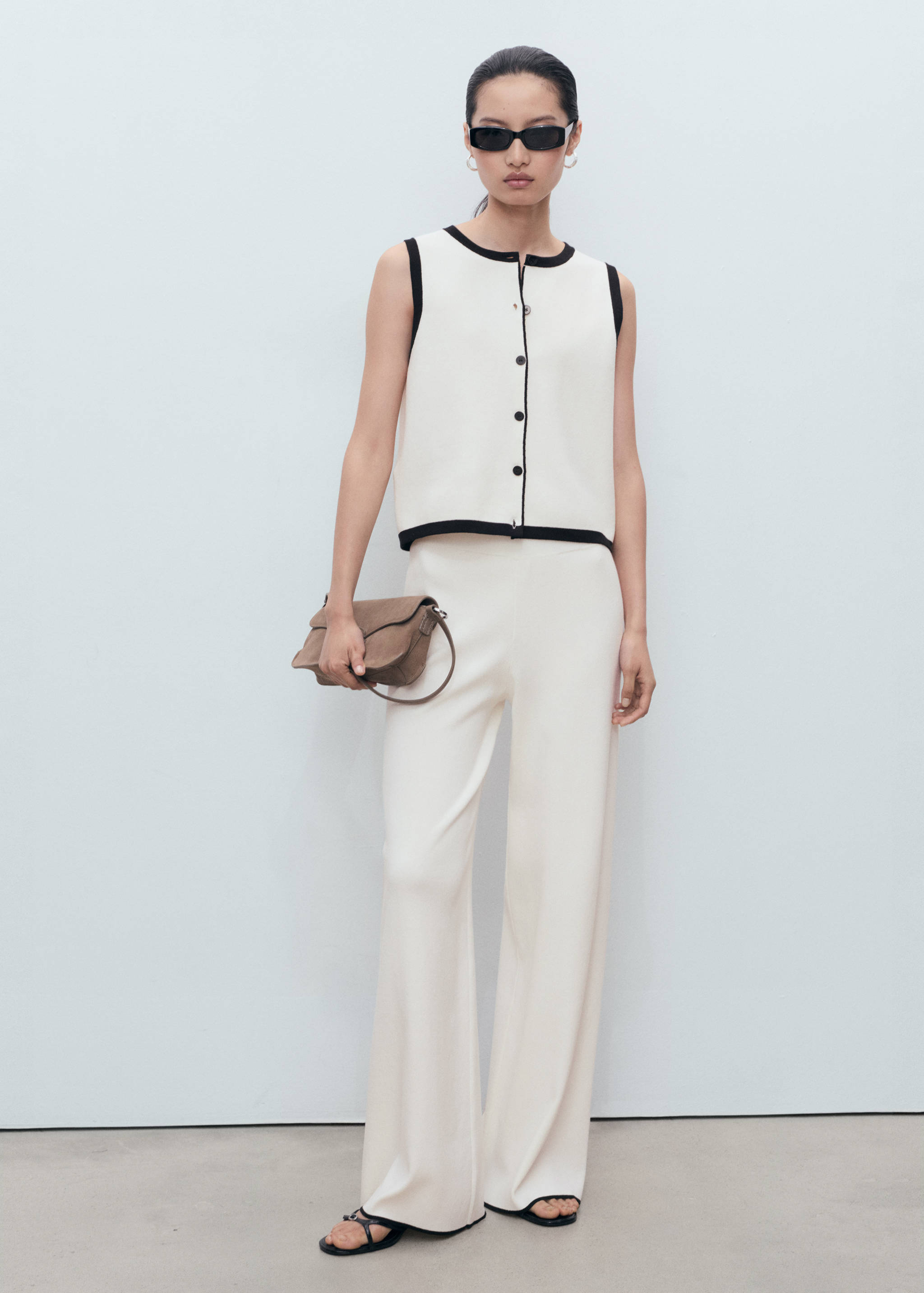 Contrasting low-rise knitted trousers - General plane