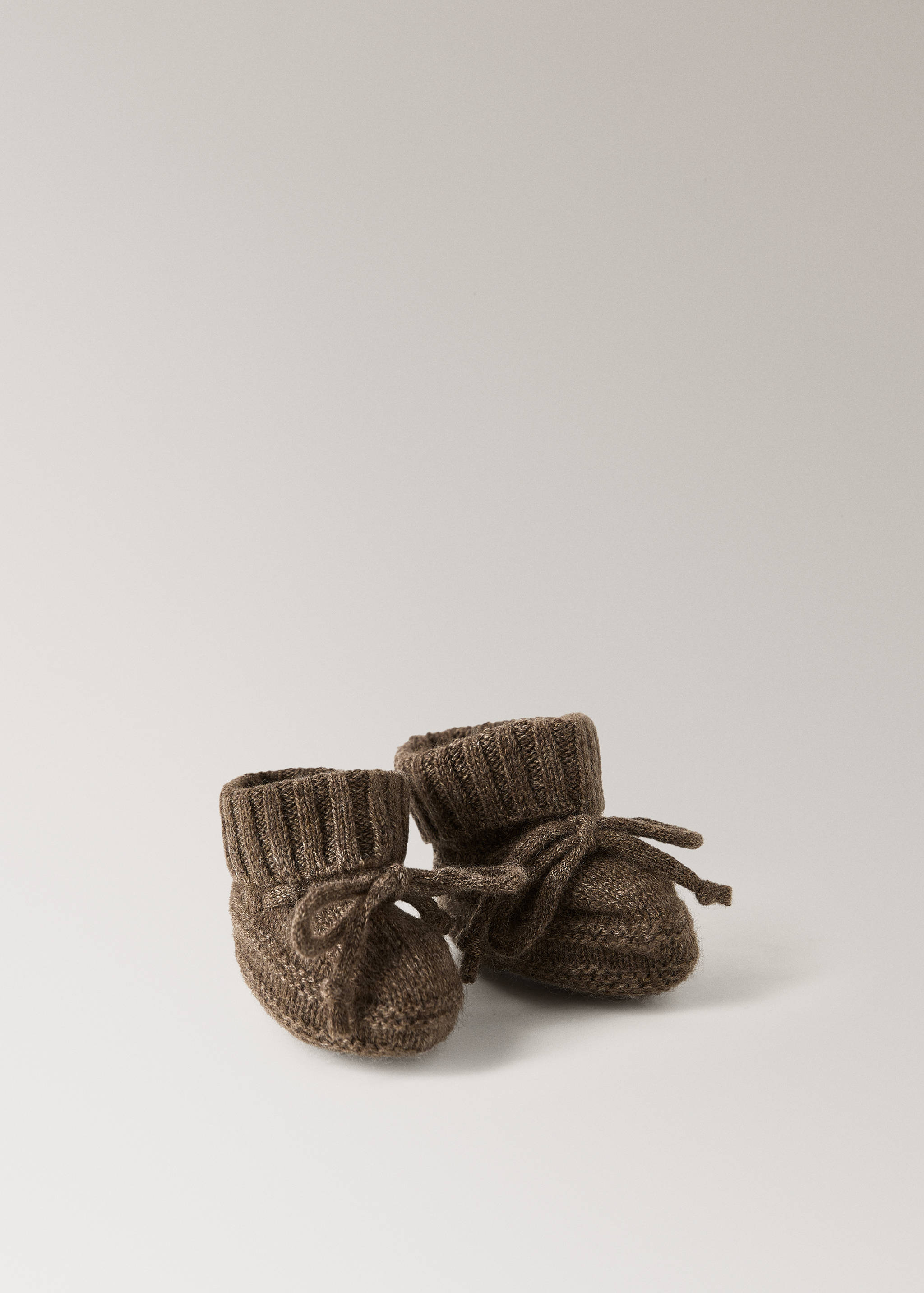 Gestrickte Babyschuhe mit Schleife - Detail des Artikels 1