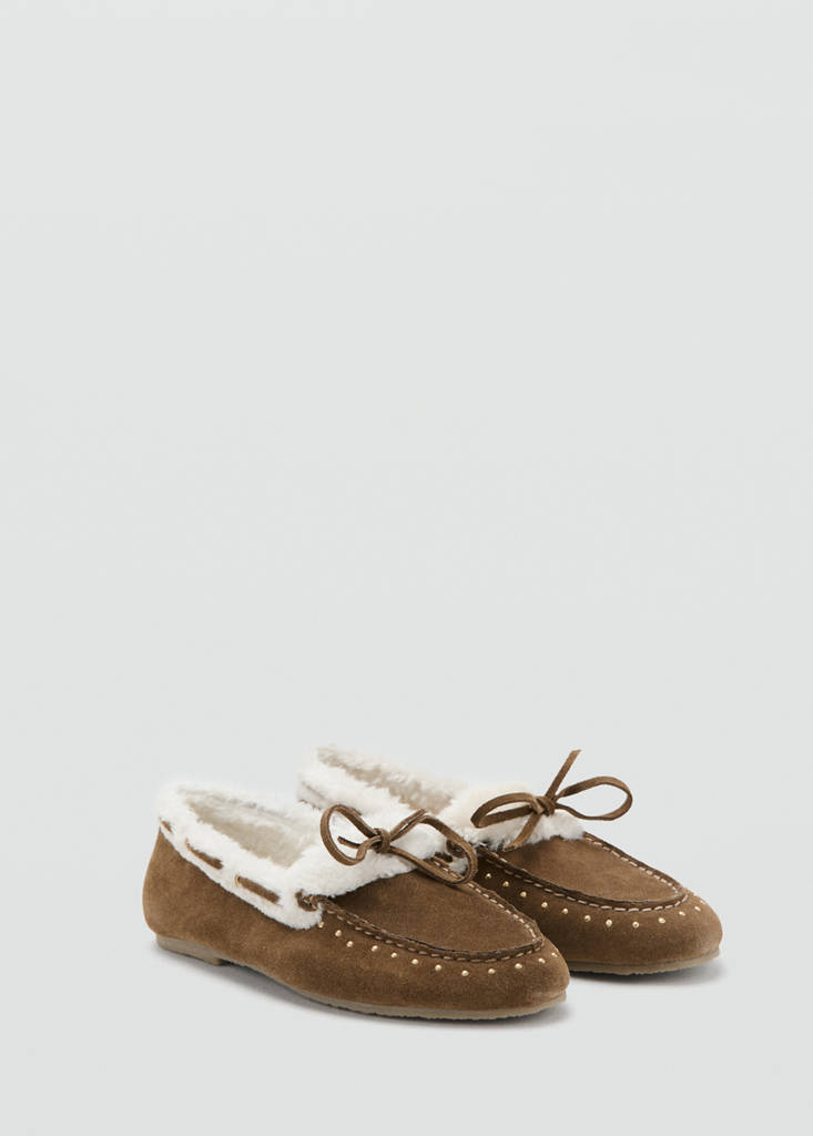 Sheepskin studded moccasins — Leather
