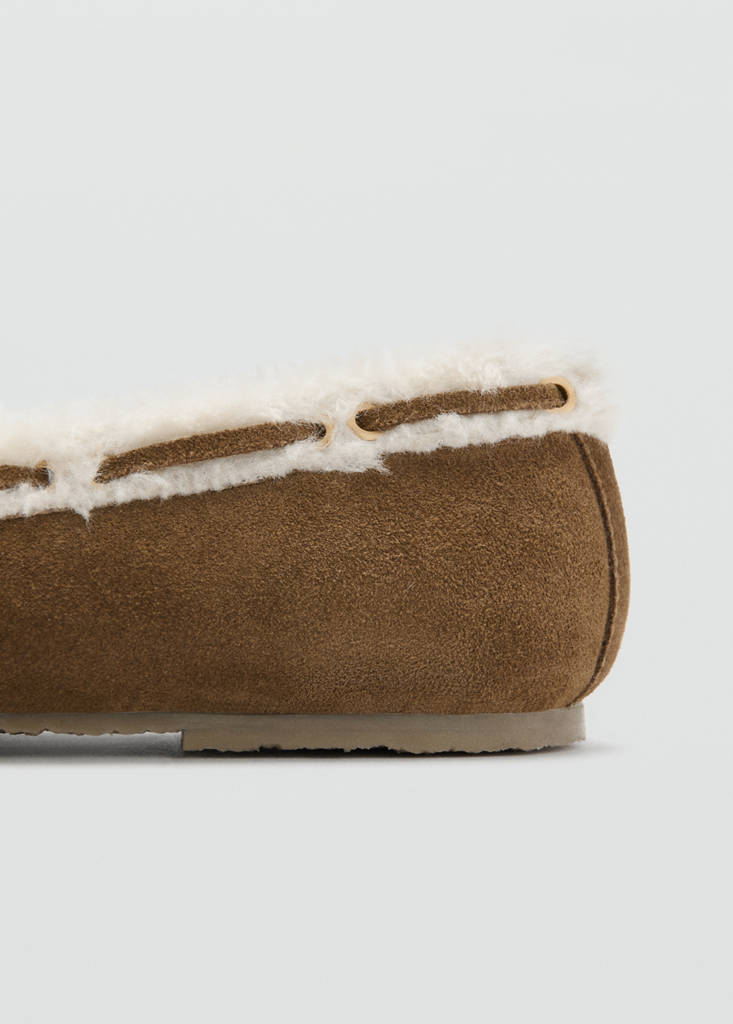 Sheepskin studded moccasins — Leather