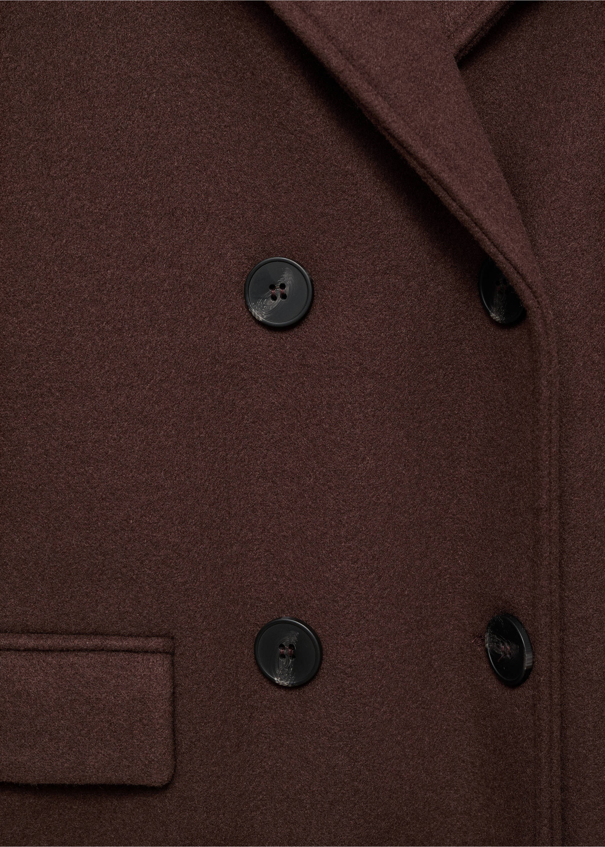 Close-up of a brown coat showing its fabric, notched lapel, and double-breasted buttons., Brown. Ref: 17095812-00.