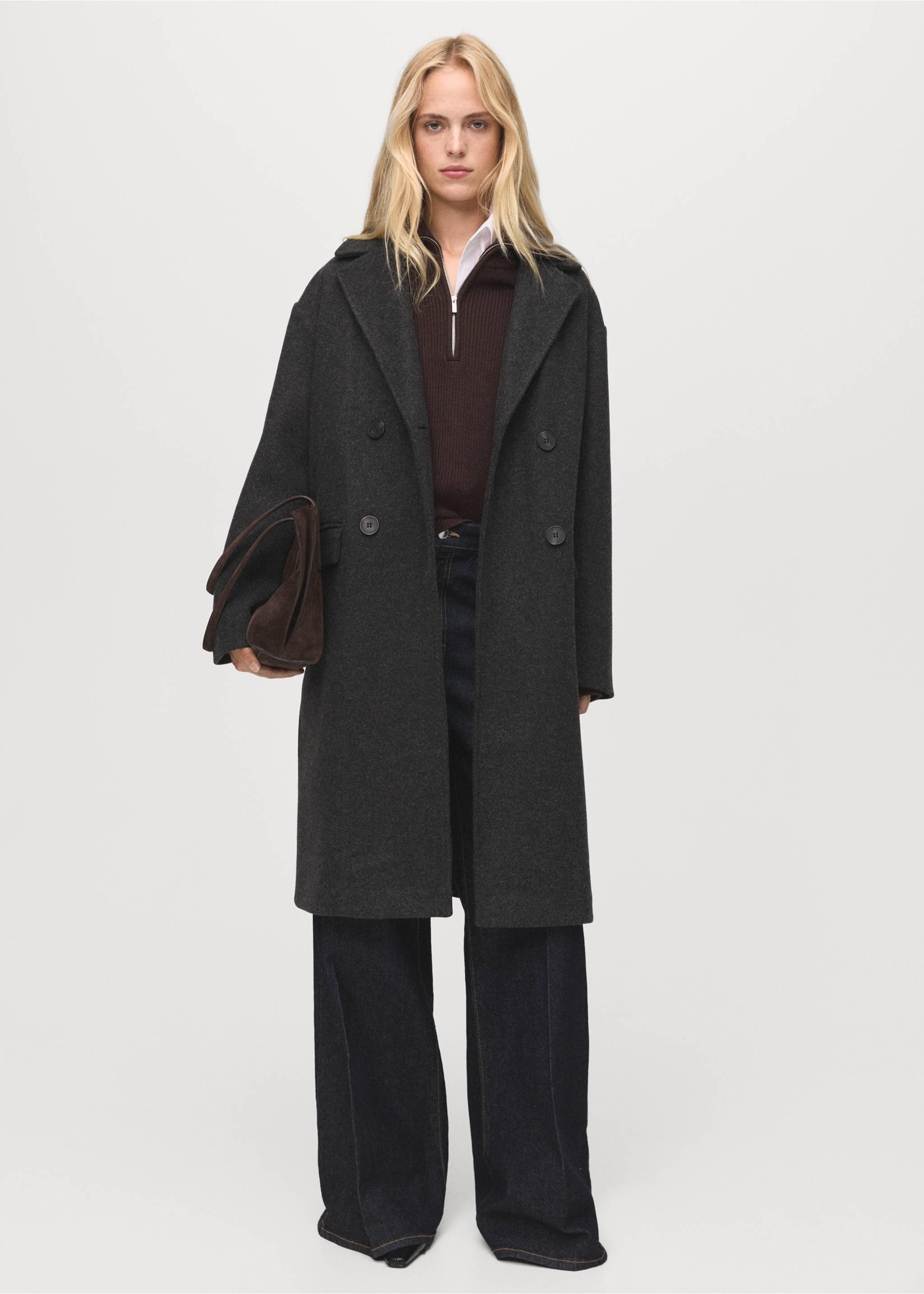 Dark grey double-breasted coat with lapels, worn with a brown zip-up sweater and wide-leg trousers., Charcoal. Ref: 17095812-00.