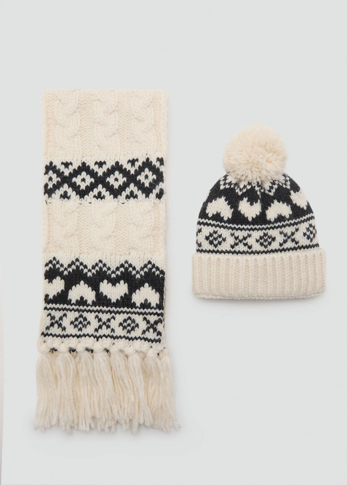 Knitted bobble hat — Ecru