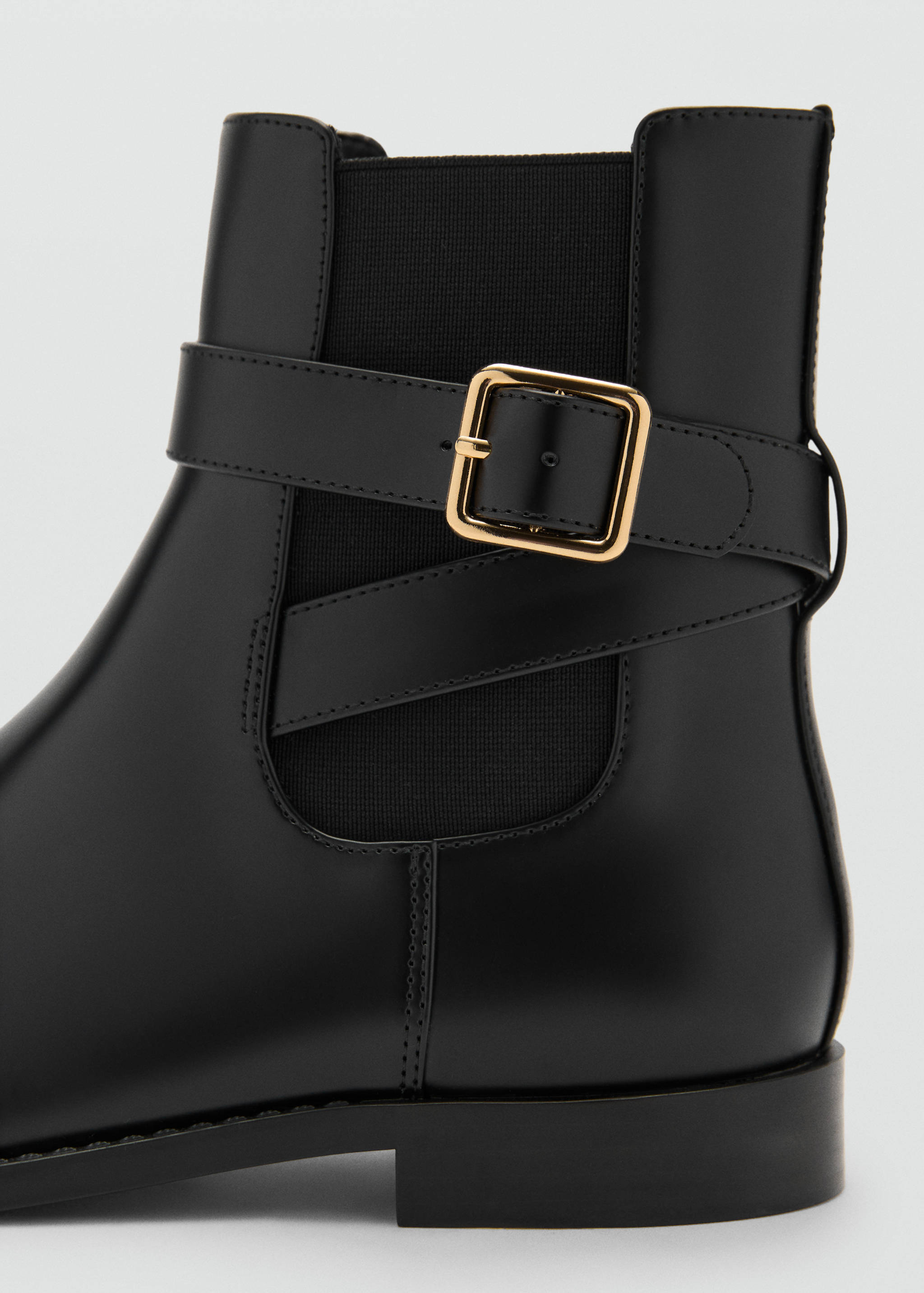 Ankle boots with elastic panel and buckle - Details of the article 1