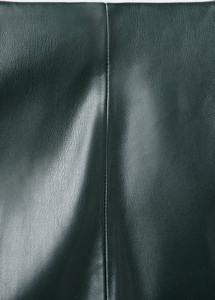 Faux-leather flared trousers — Green